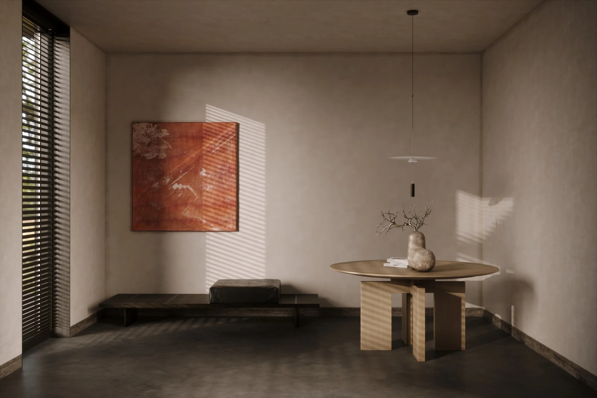 Minimalist interior room with a round wooden table, decorative stone vase with bare branches, a black bench with a cushion, abstract red artwork on the wall, and sunlight casting striped shadows through window blinds.