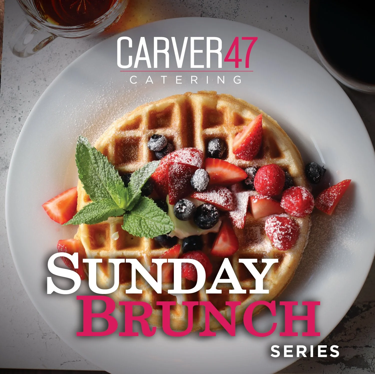 A white plate with a waffle topped with fresh strawberries, blueberries, raspberries, a sprig of mint, and powdered sugar, with a cup of coffee and a glass of tea nearby, promoting a Sunday brunch series by Carver47 Catering.