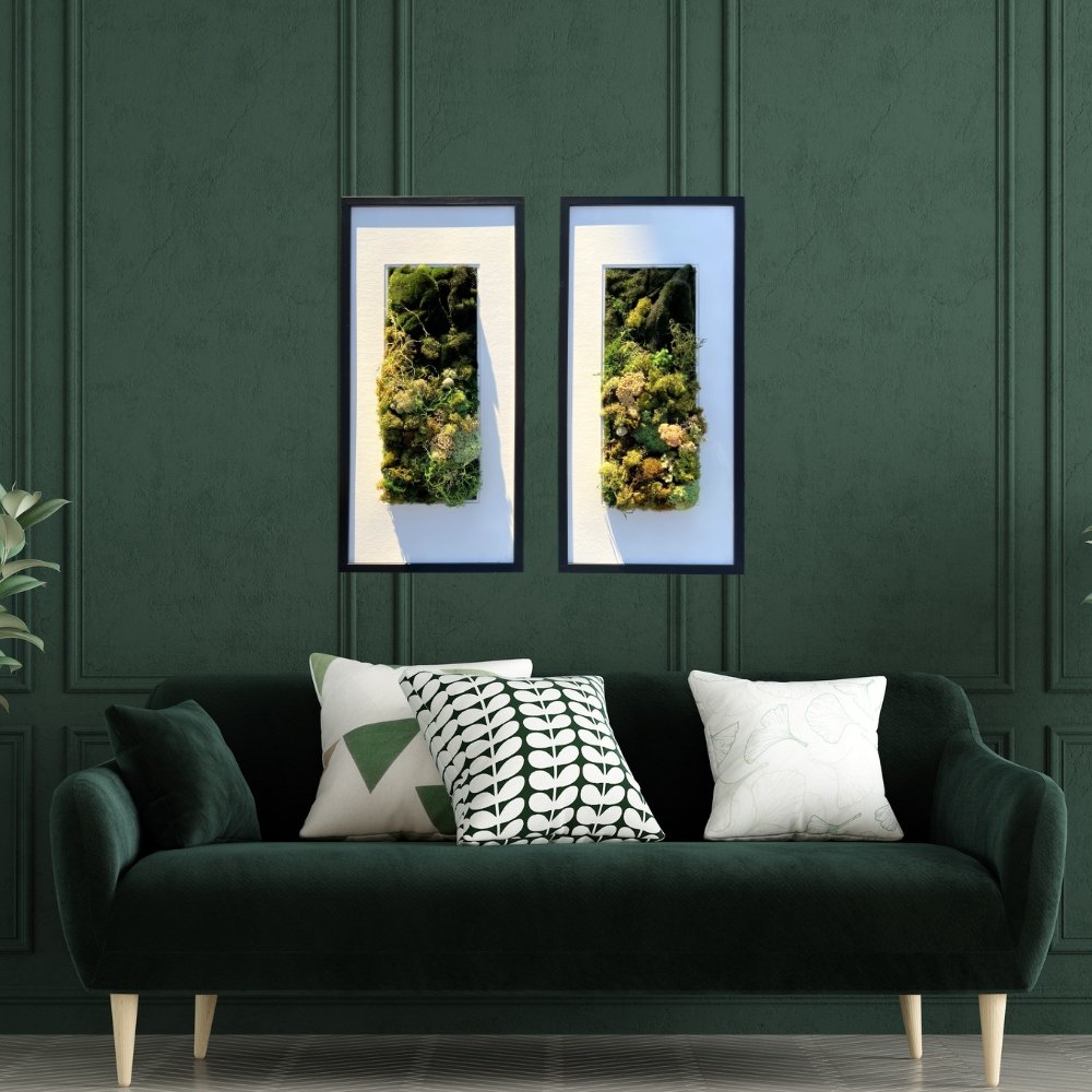 moss art diptych hanging on green wall above green sofa