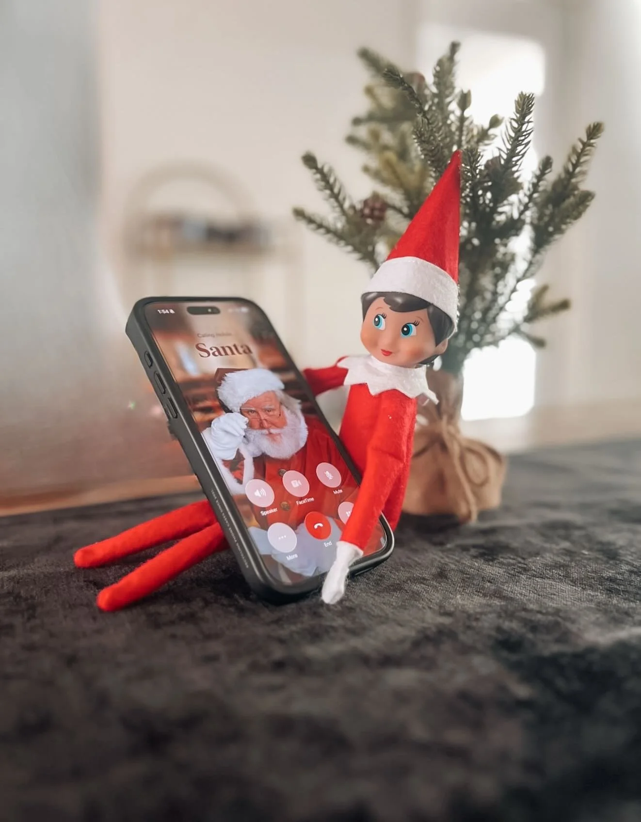 Elise is calling Santa to remind him of our holiday hours!🎅🏼

🎄CLOSED: December 24 &amp; 25
🎄 OPEN: December 26, 12PM-5PM 

Stop by the Office if you need anything!