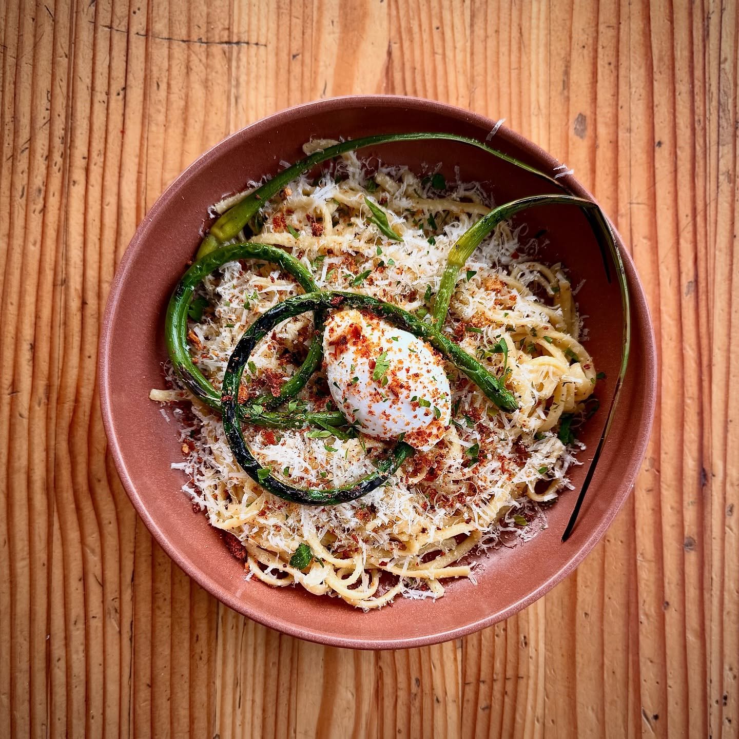 Eat like a grown up. Bring your kids too. 

High Spring Linguine:
Grilled @deschutes_canyon_garlic garlic scapes, poached @goodspeedfamilyfarms egg and anchovy butter over house made organic linguine, topped with garlic bread crumbs and parmigiano.

