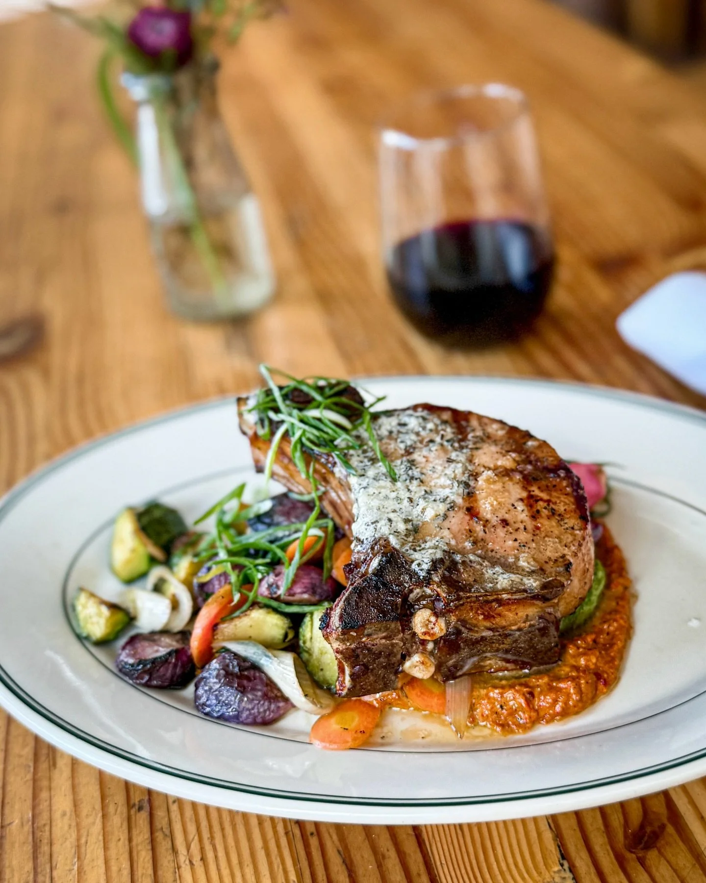 Our new spring pork chop, featuring all kinds of local bounty.

Olympia Provisions Pork Chop 
Grilled and served with lemon herb butter, roasted seasonal veggies, romesco sauce, and house pickled veggies. Served with a side salad to start.

Pastured 