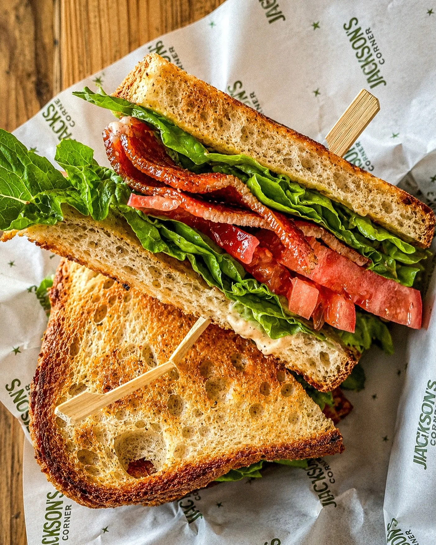Summer BLT 🌻

Local heirloom tomatoes, Boundless Farmstead little gem lettuce, Hill&rsquo;s thick-cut bacon, and garlic aioli on toasted Corner Loaf sourdough.

Served with potato salad, side salad, olive oil chips, or a cup of soup.

Find it on our