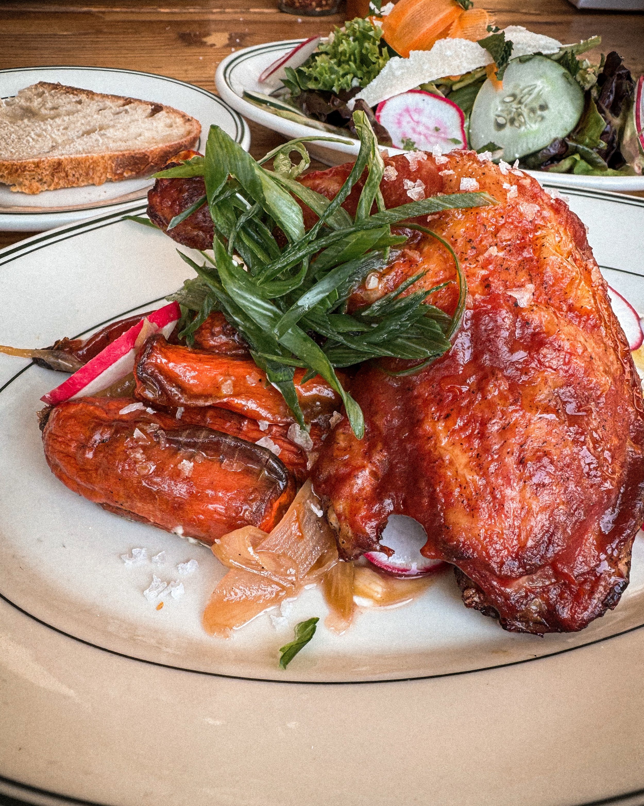 Slow-cooked Zodiac Farms chicken quarter, finished crispy with cherry-whiskey barbecue sauce. Served with roasted Boundless Farmstead carrots, pickled rhubarb, and garlic yogurt.

We&rsquo;re excited to partner with Zodiac Farms, a Central Oregon far