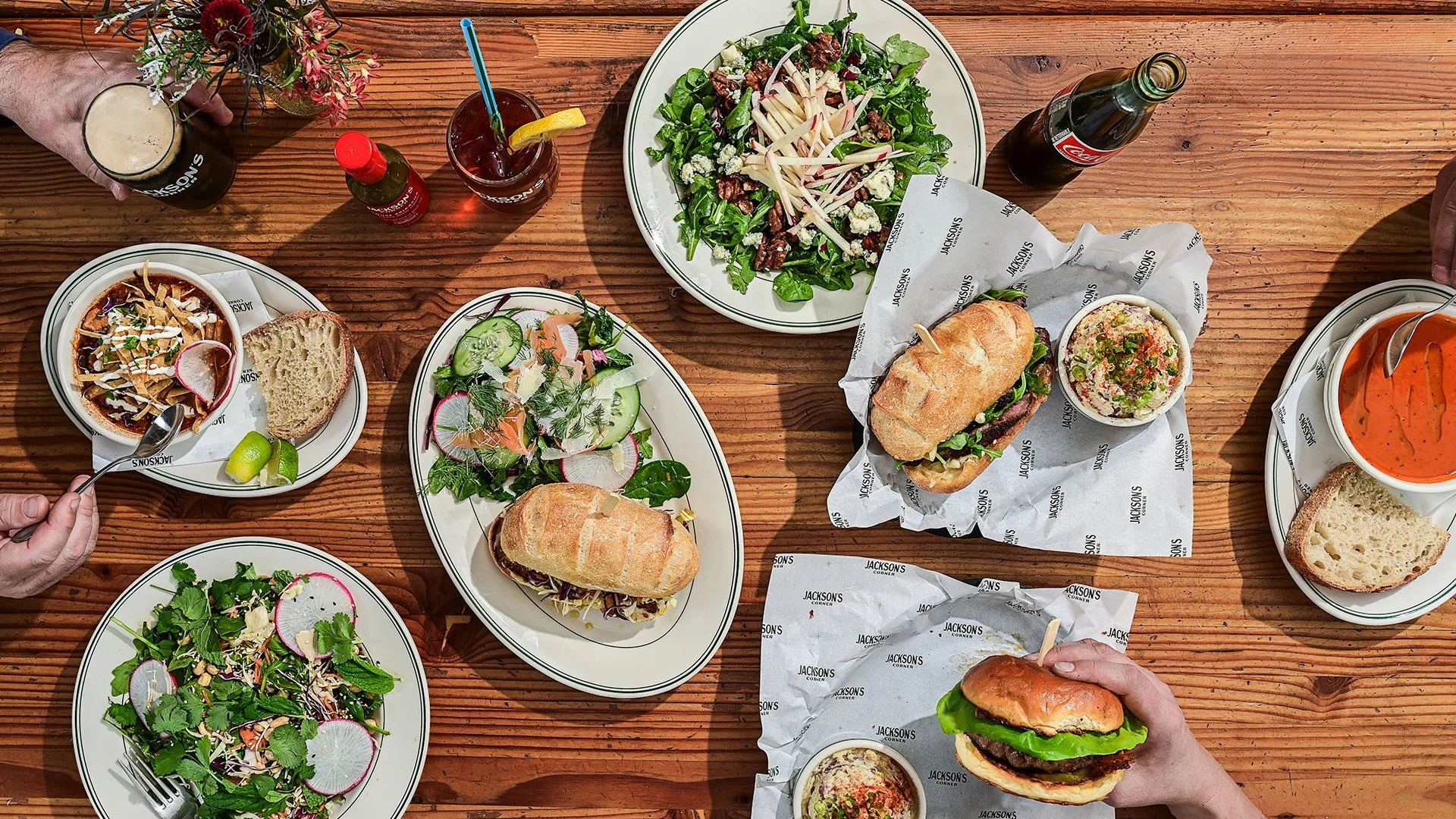 A variety of lunch dishes including salads, sandwiches, and soups from Jackson's Corner Bend, OR