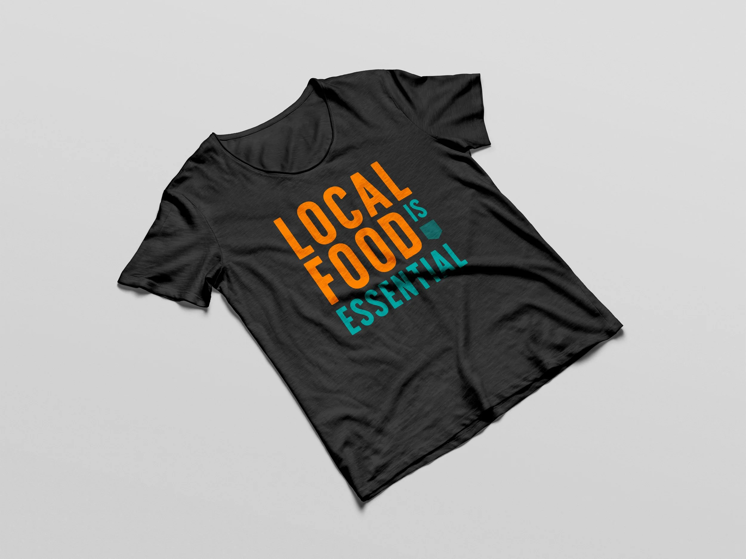 T-Shirt for Local Food is Essential. Graphic Design + Logo Design: Jack Boyum