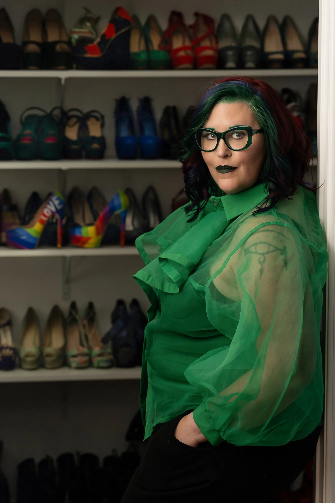 Portrait of shoe collector in her closet
