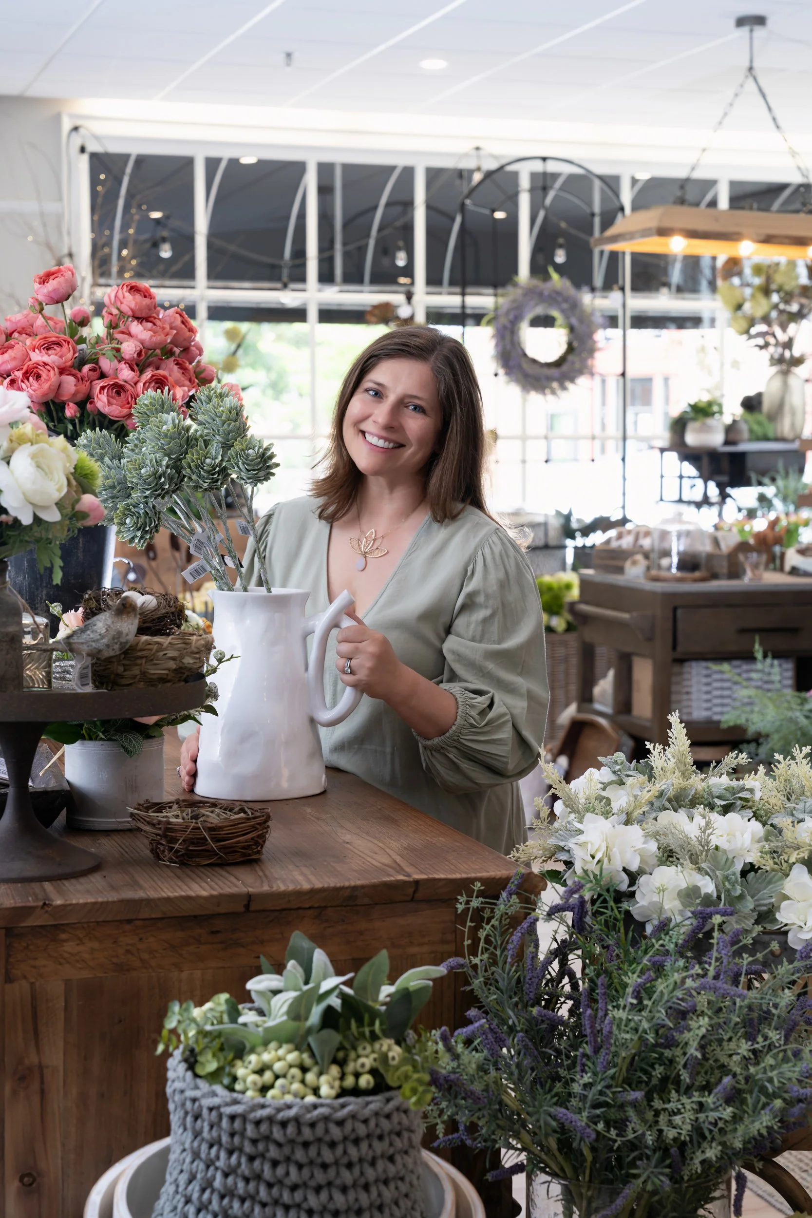 Portrait of a gift shop owner in her shop
