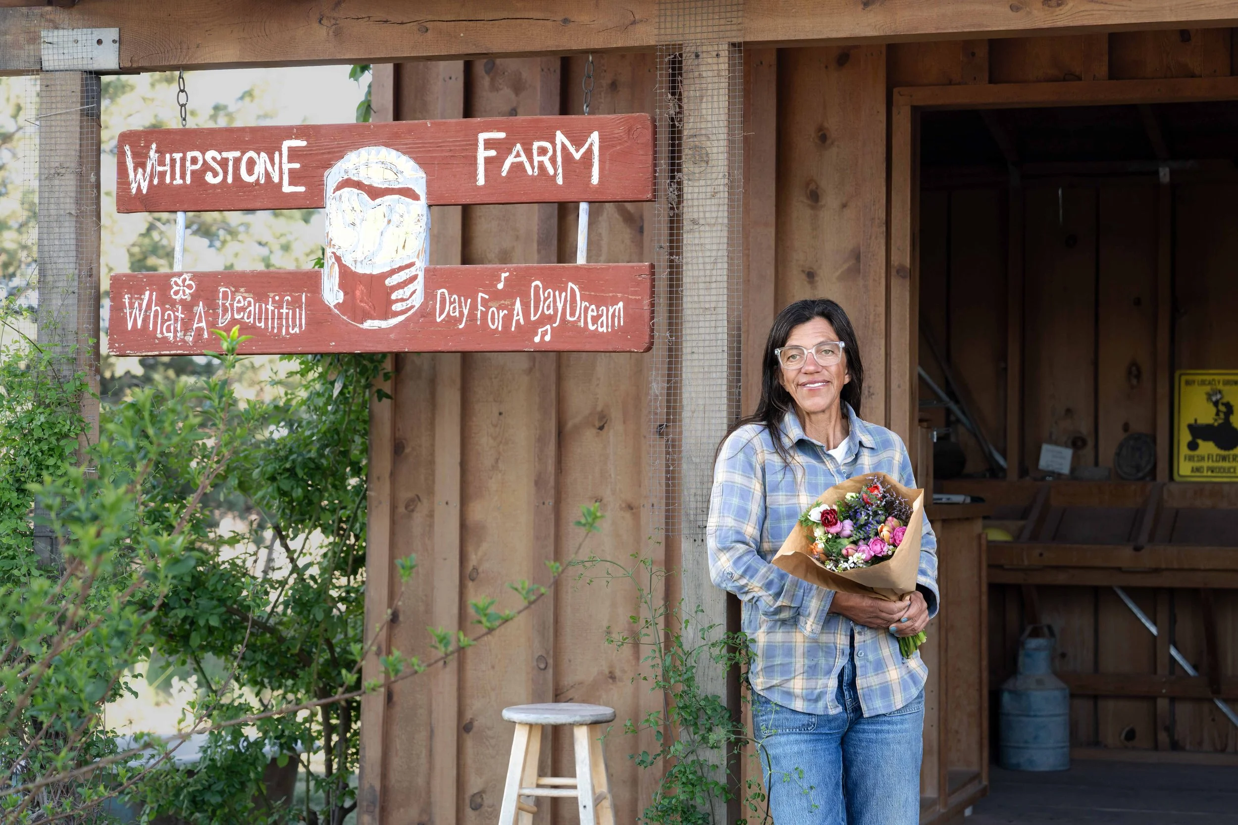 Shanti standing in the farmstand at Whipstone Farm