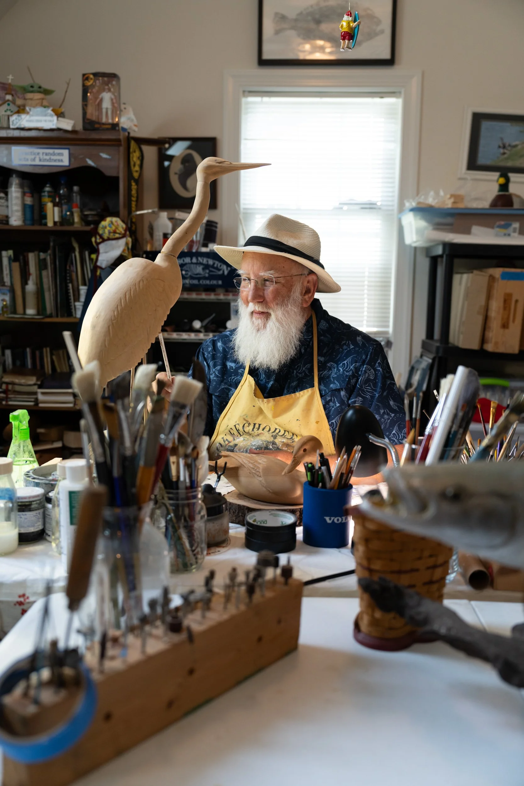 Dynamic portrait of a sculptor in his studio
