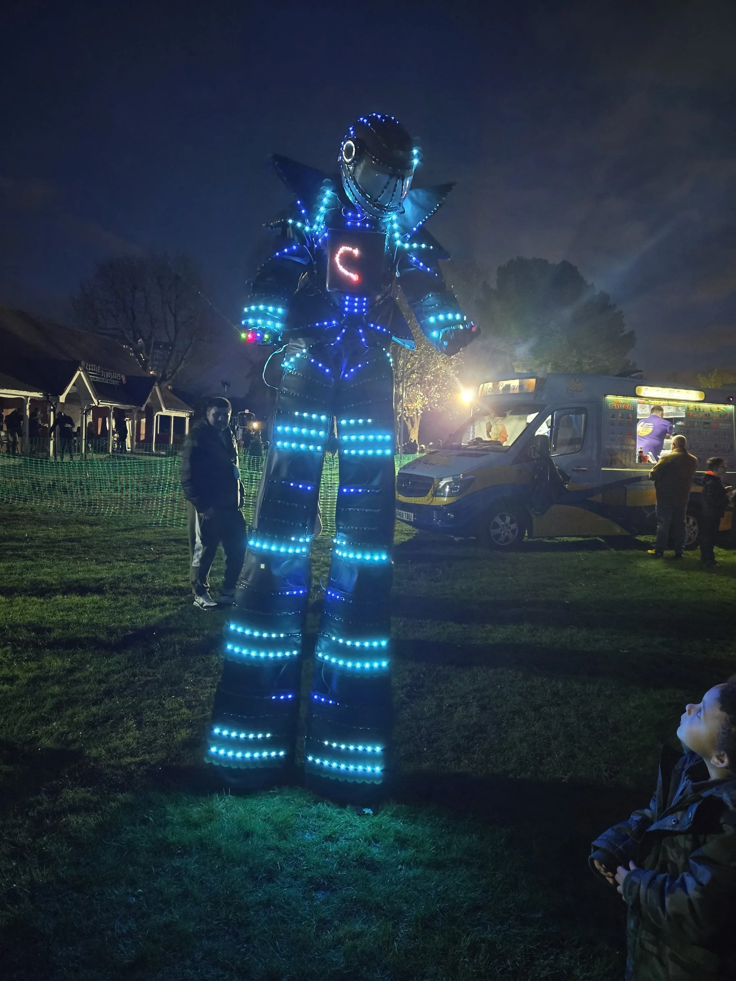 glowbot stilt walker halloween 