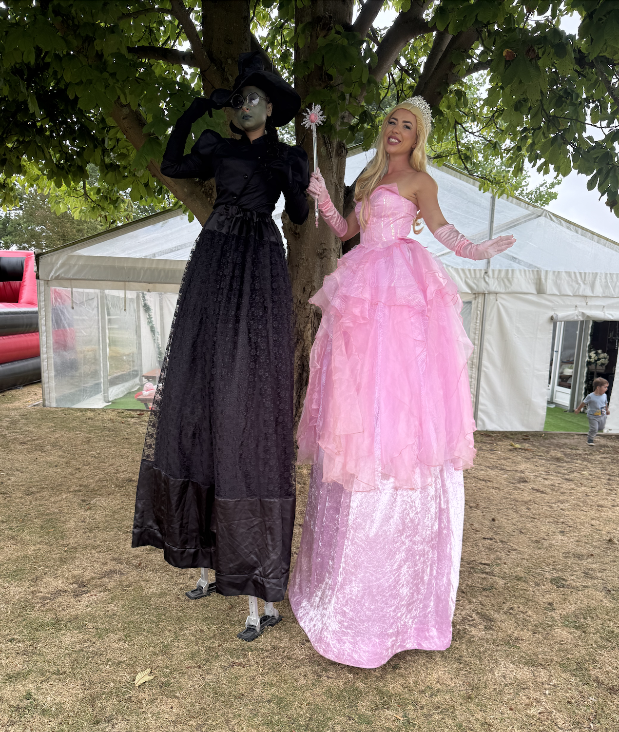 stilt walking elphaba and Glinda