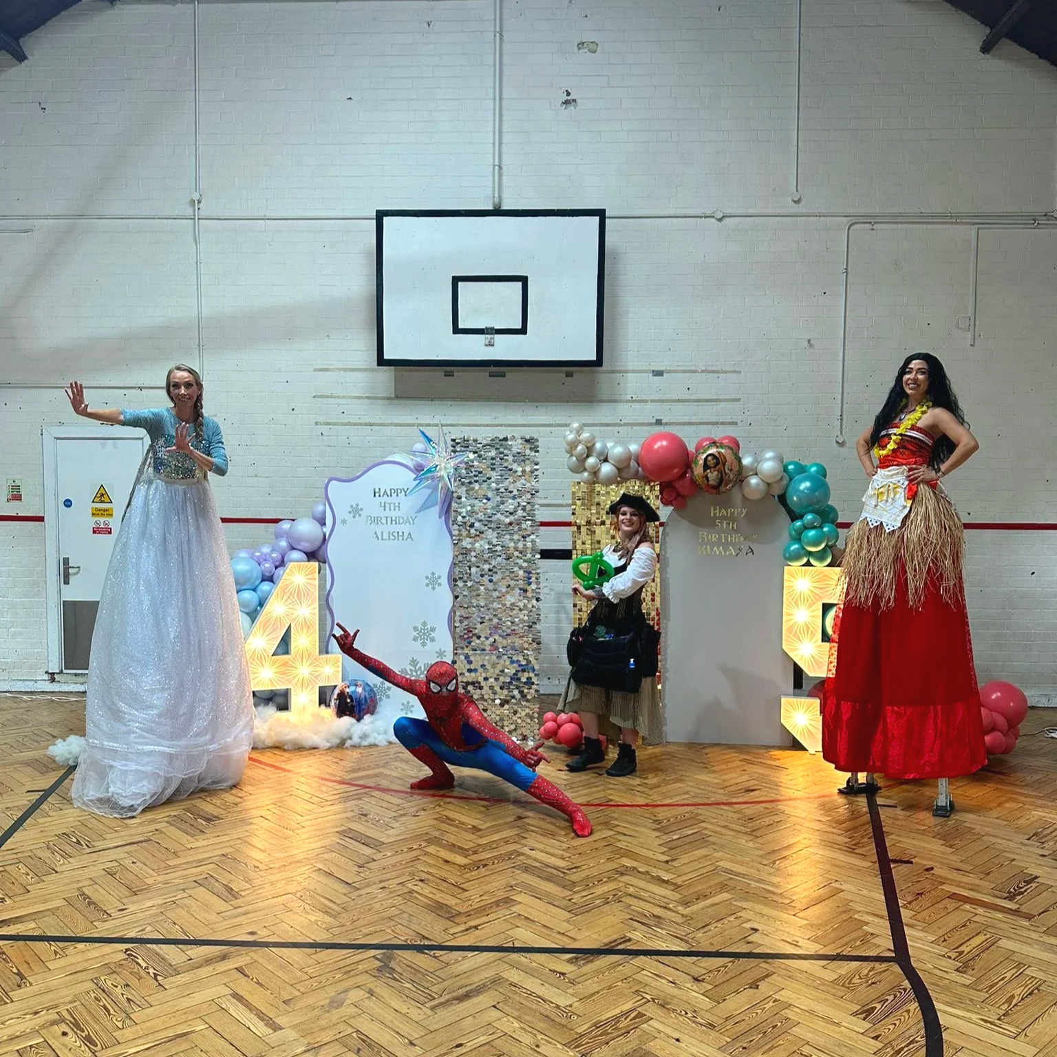 stilt walking Elsa and moana, spider-man actor and pirate balloon modeller