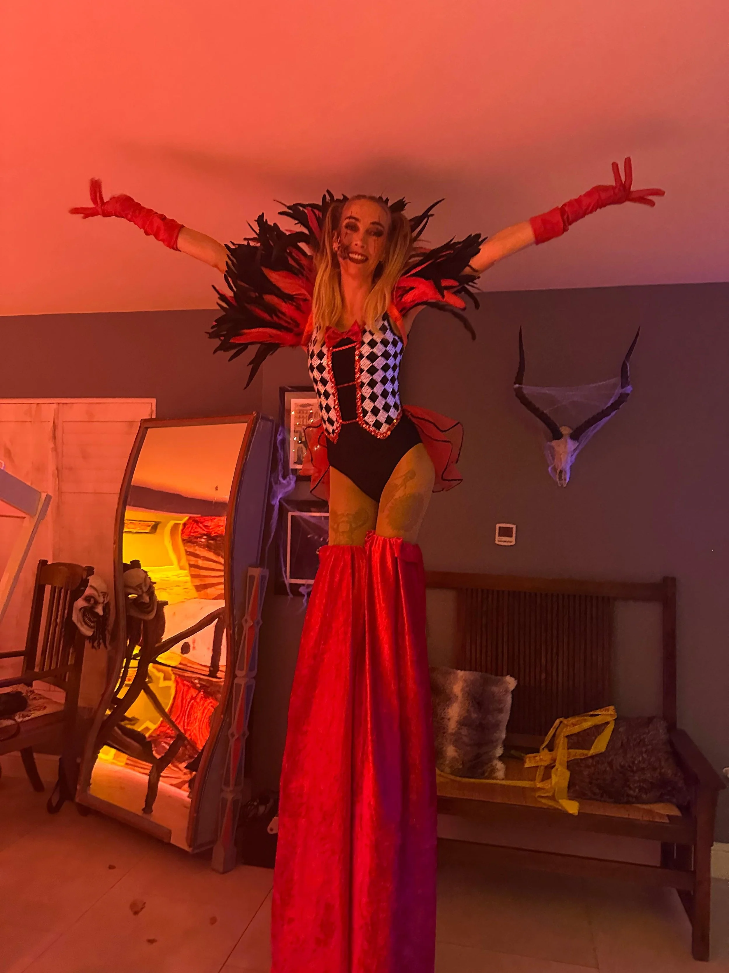 Stilt walking circus showgirl at a private halloween house party 