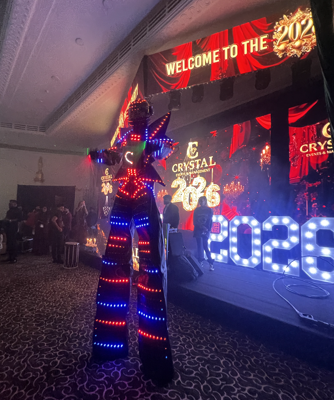 glowbot stilt walker at crystal Hayes new years eve 