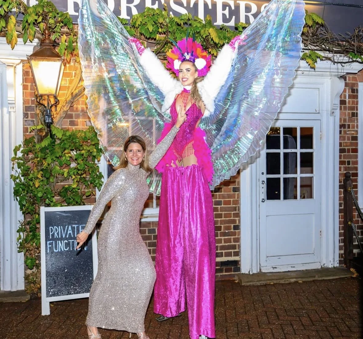 pink showgirl stilt walker for a birthday party at the foresters in Farnham common 