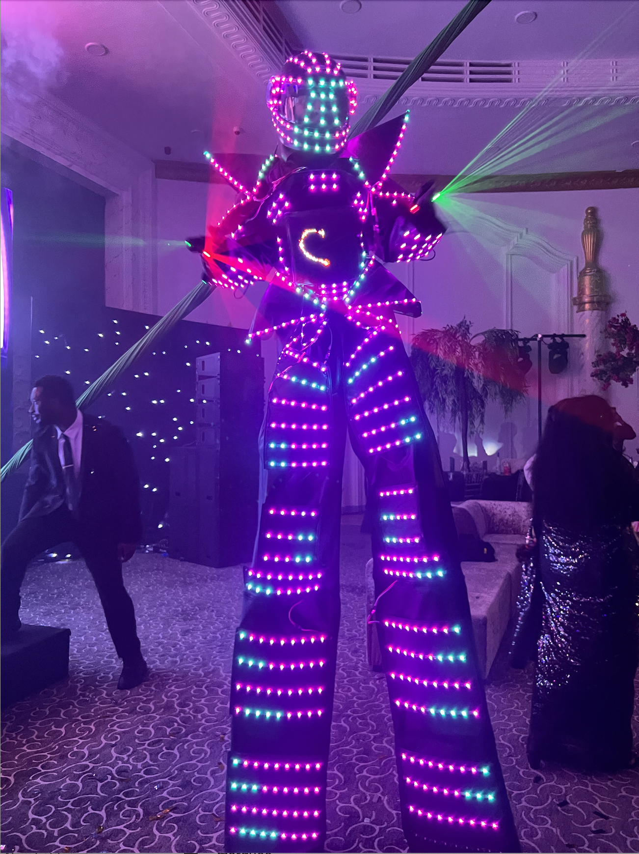 Glowbot stilt walker glitz and glam at crystal Hayes 