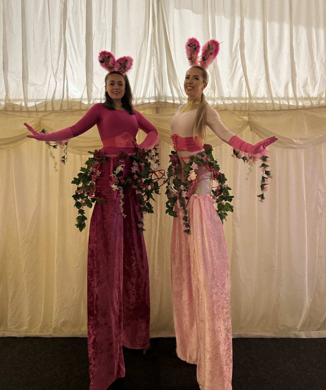 floral pink bunny stilt walkers