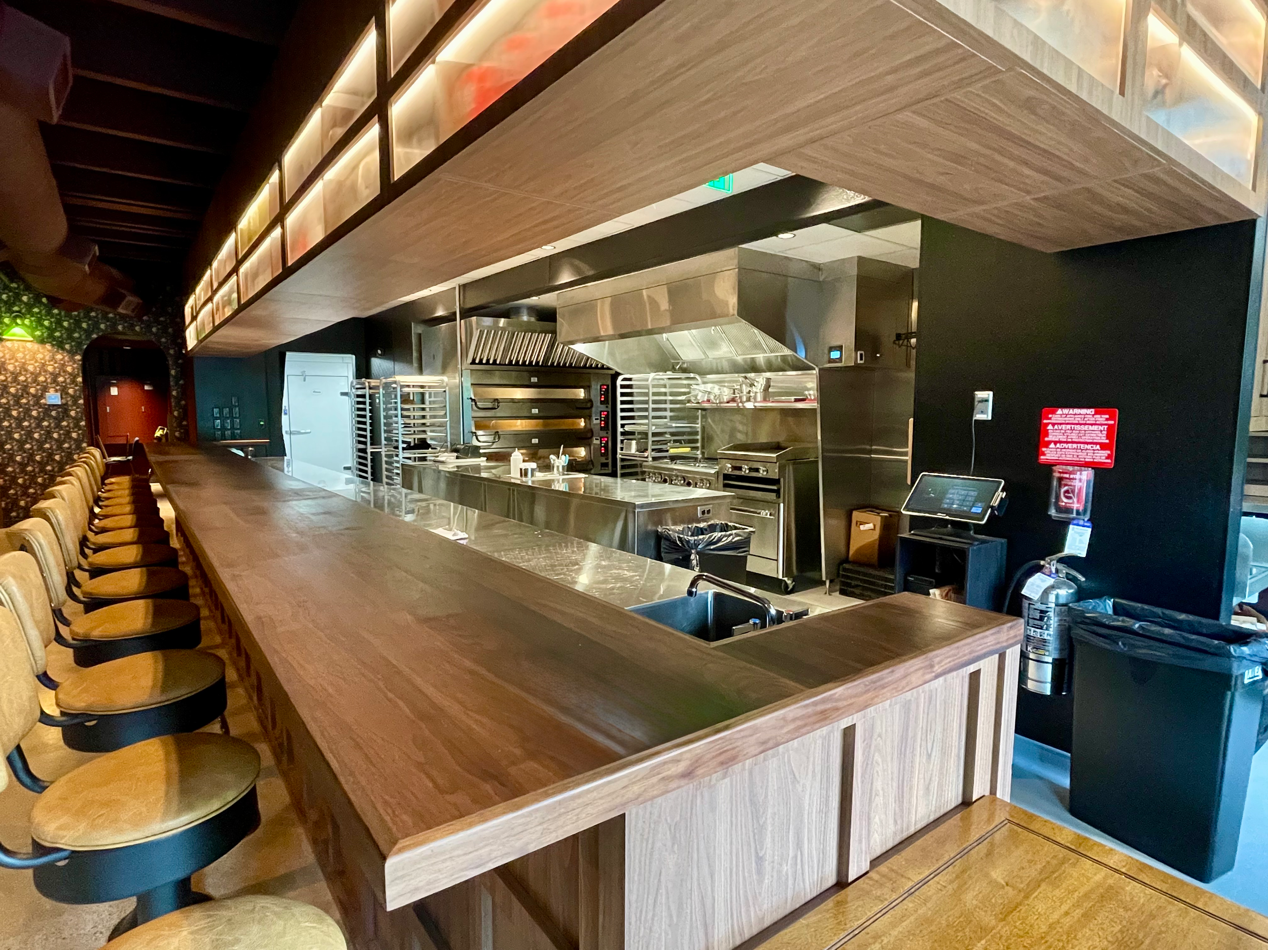 Custom bar and open commercial kitchen at St. Vito Focacceria in Nashville.
