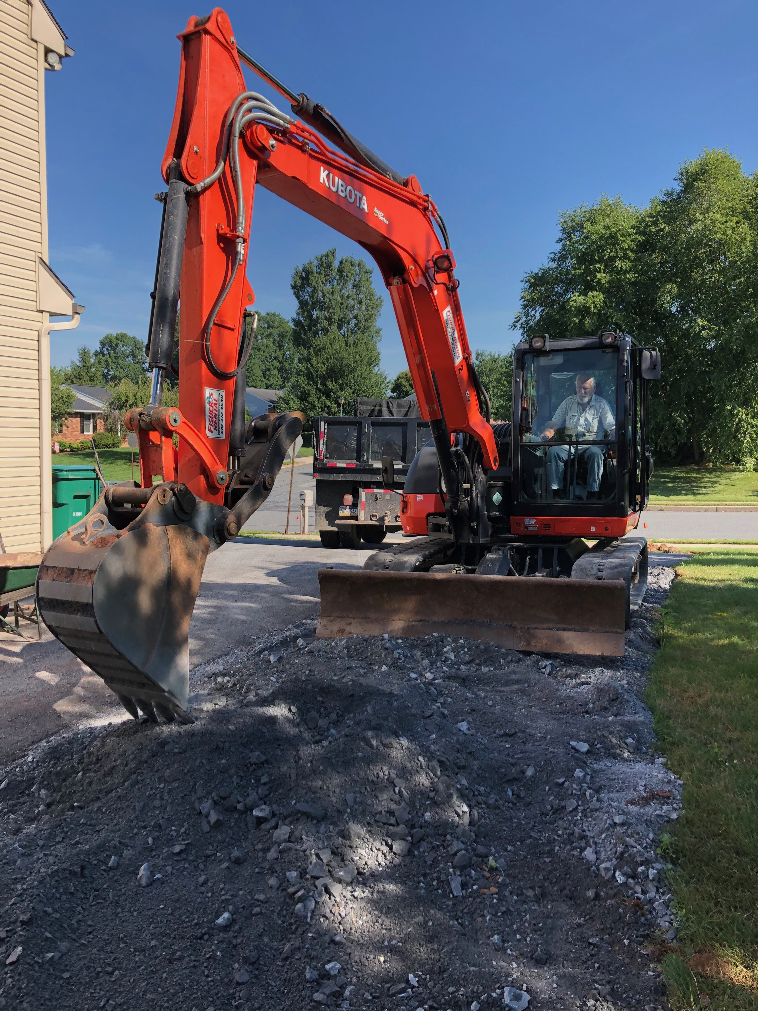 grading and excavating driveway and parking