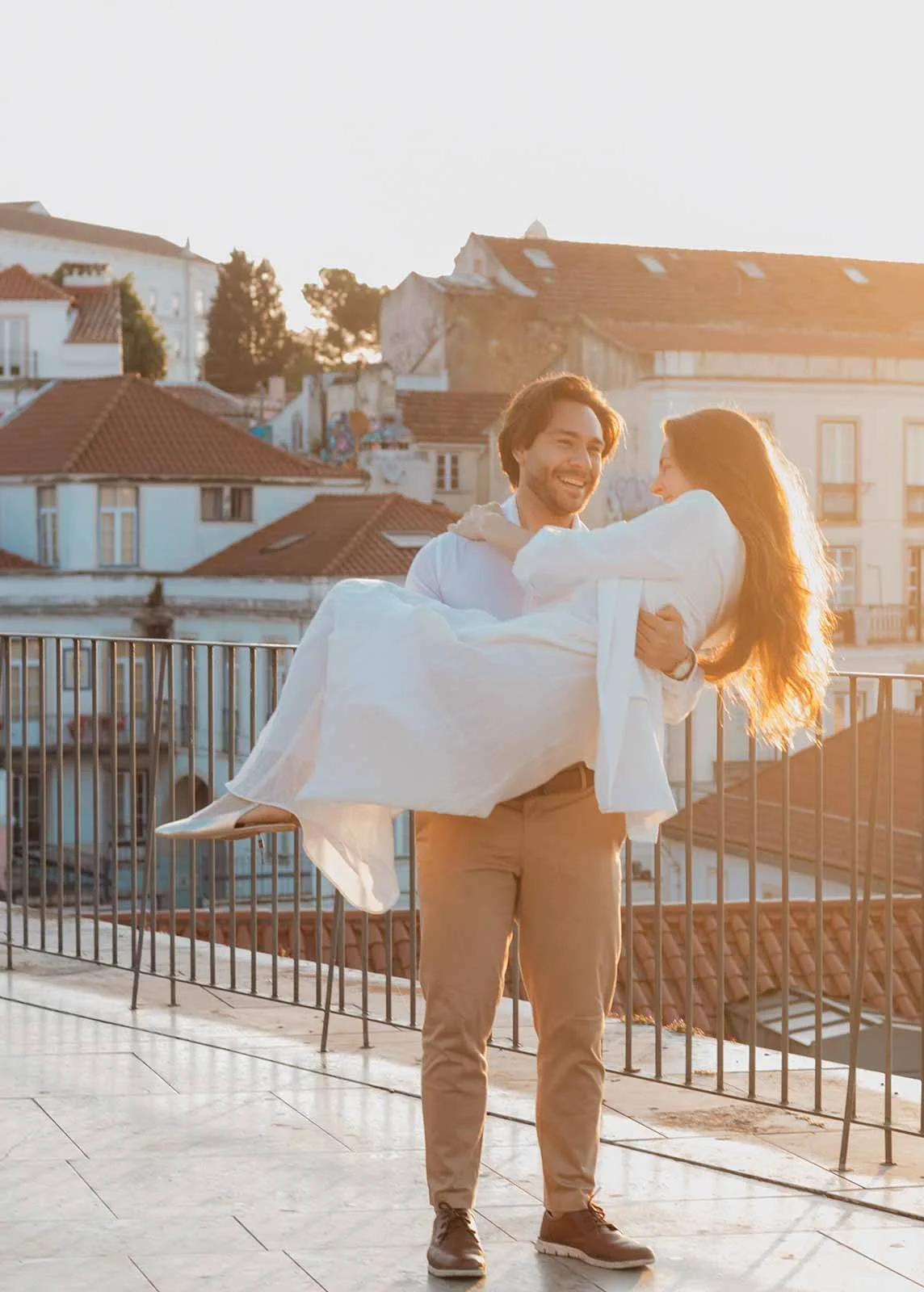 Couple at Miradouro de Portas do Sol in Alfama, Lisbon