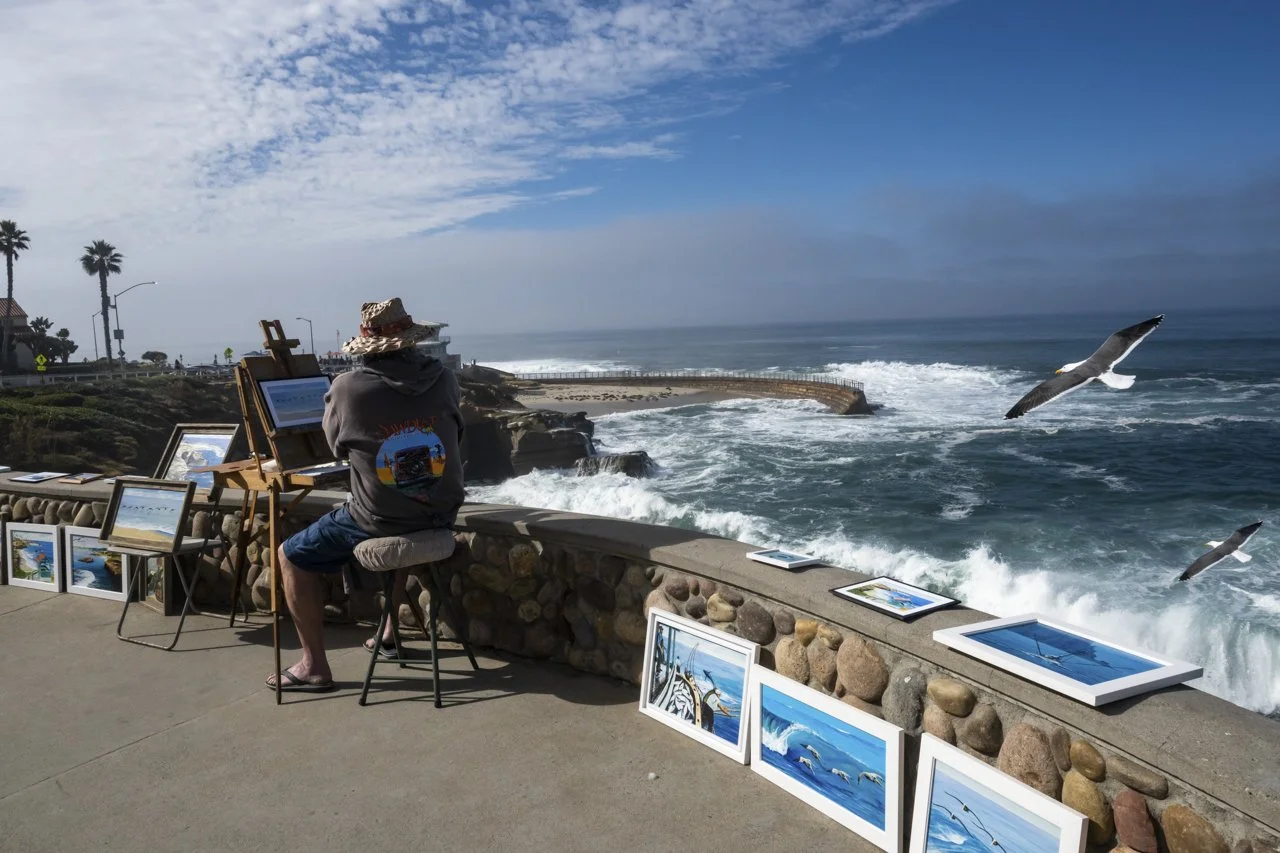 A painter in La Jolla shares the natural beauty of the location with others through their artwork.