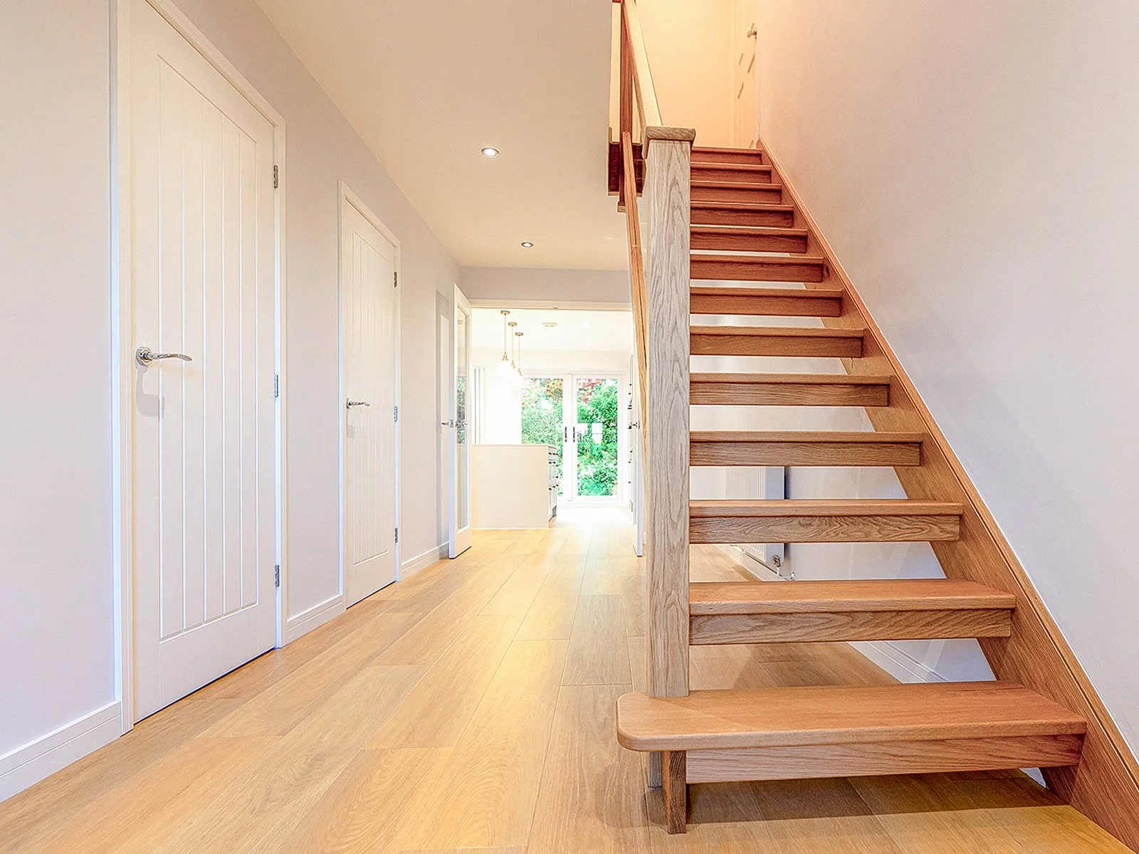 Open-Tread Staircase And Hallway Within Refurbished Home