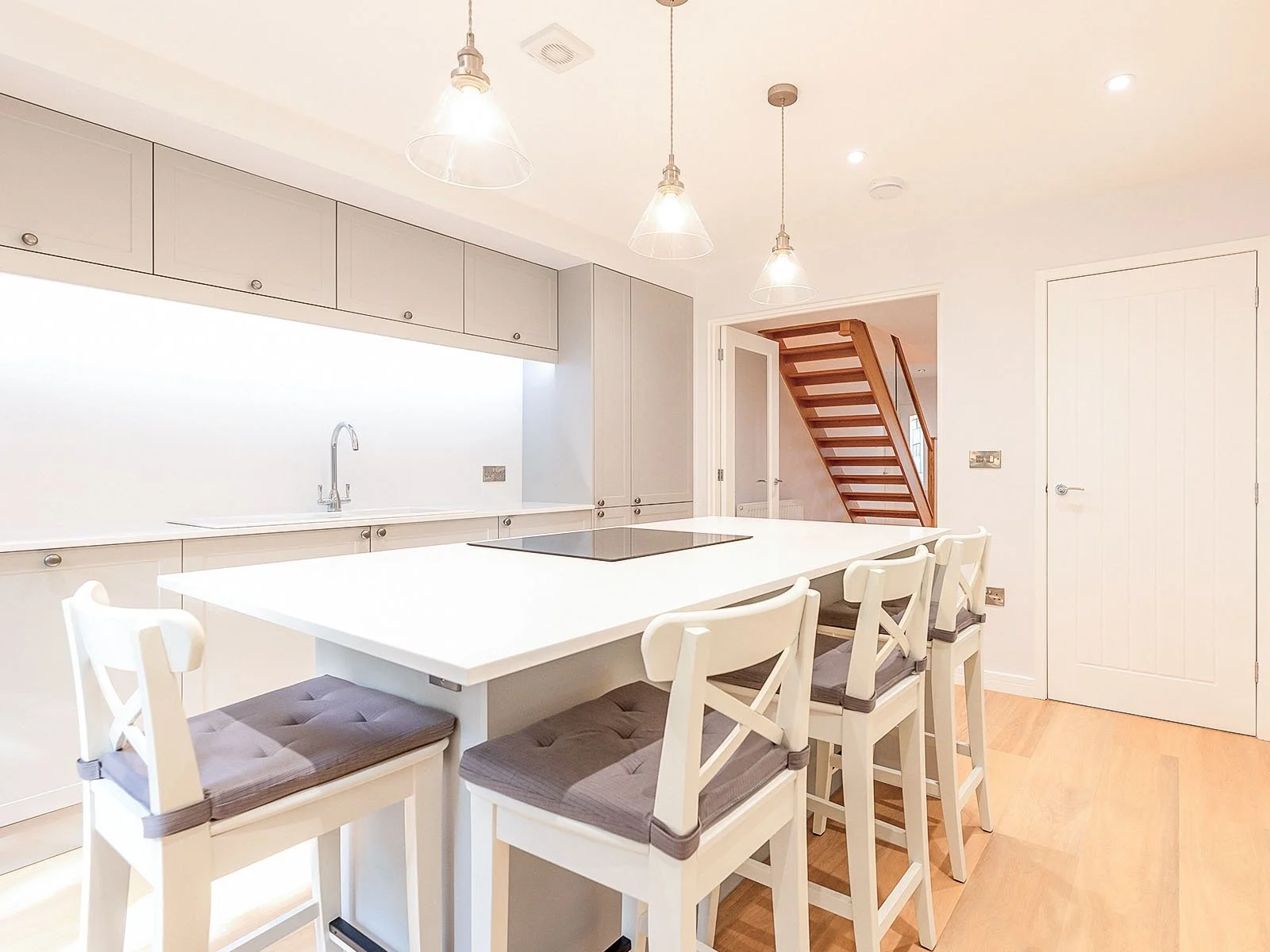 Modern Kitchen Island With Open Staircase