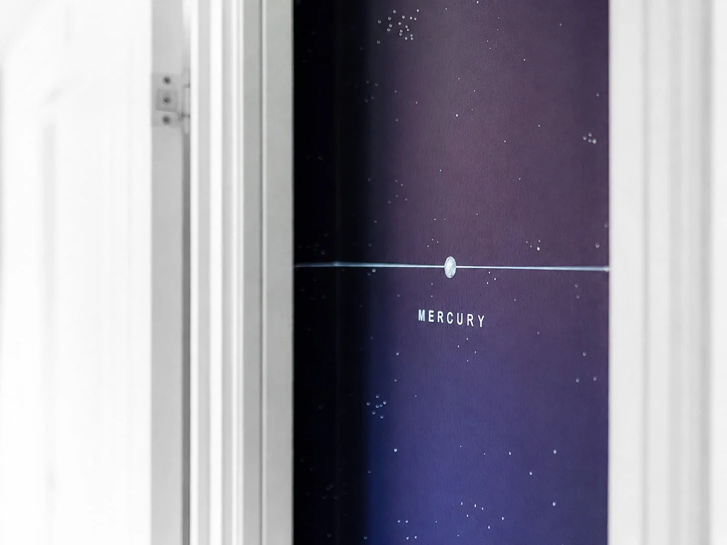 solar-system-mural-mercury-positioned-at-foot-of-stairs.jpg