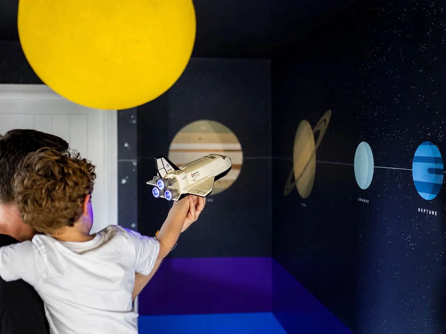 solar-system-mural-landing-wall-staircase-design.jpg