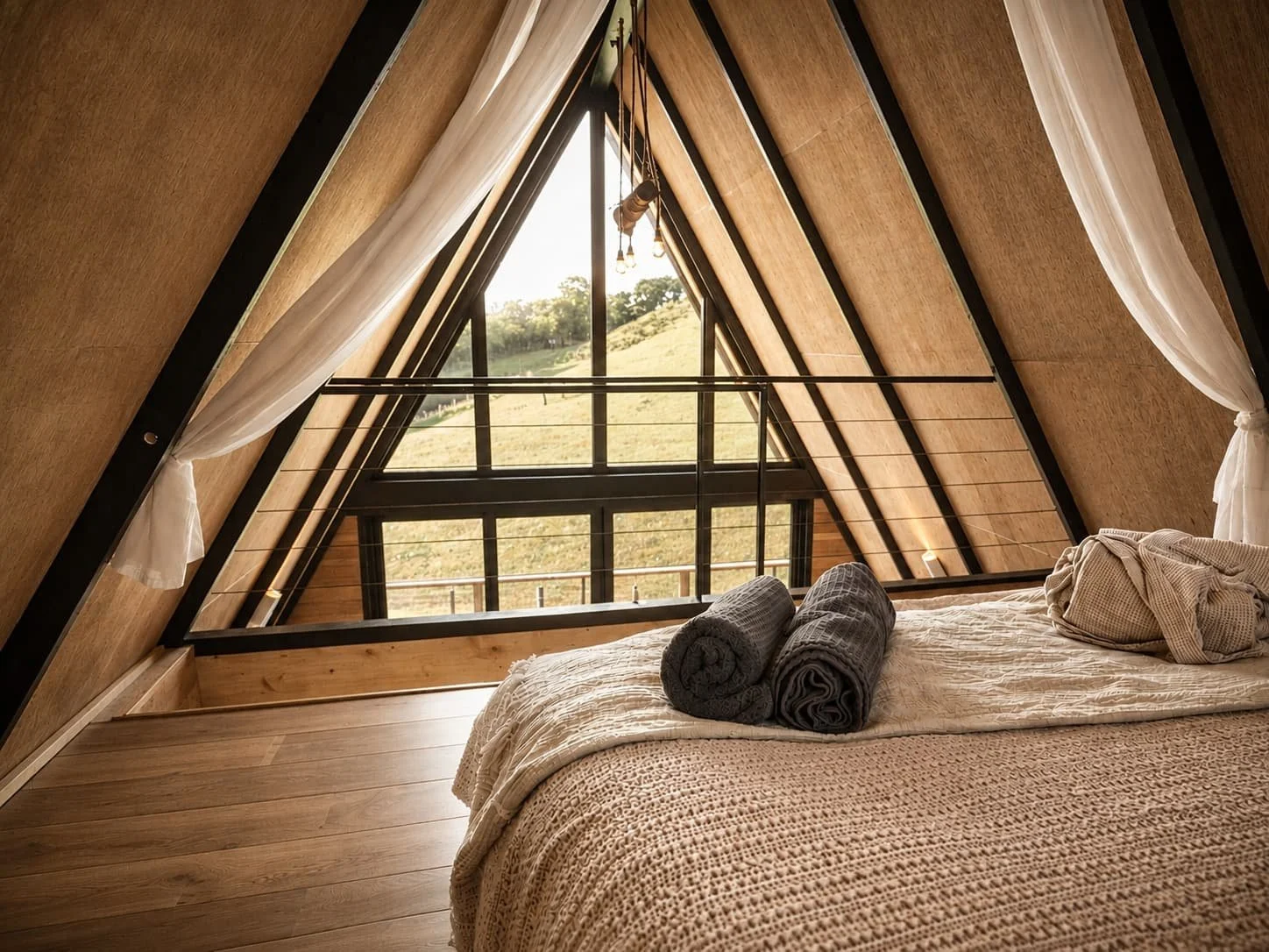 scandinavian-lodge-mezzanine-bedroom-views.jpg