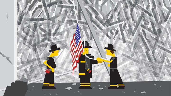 Firemen raise an American Flag over the remains of the buildings. The hard work of recovery begins but hope also returns.