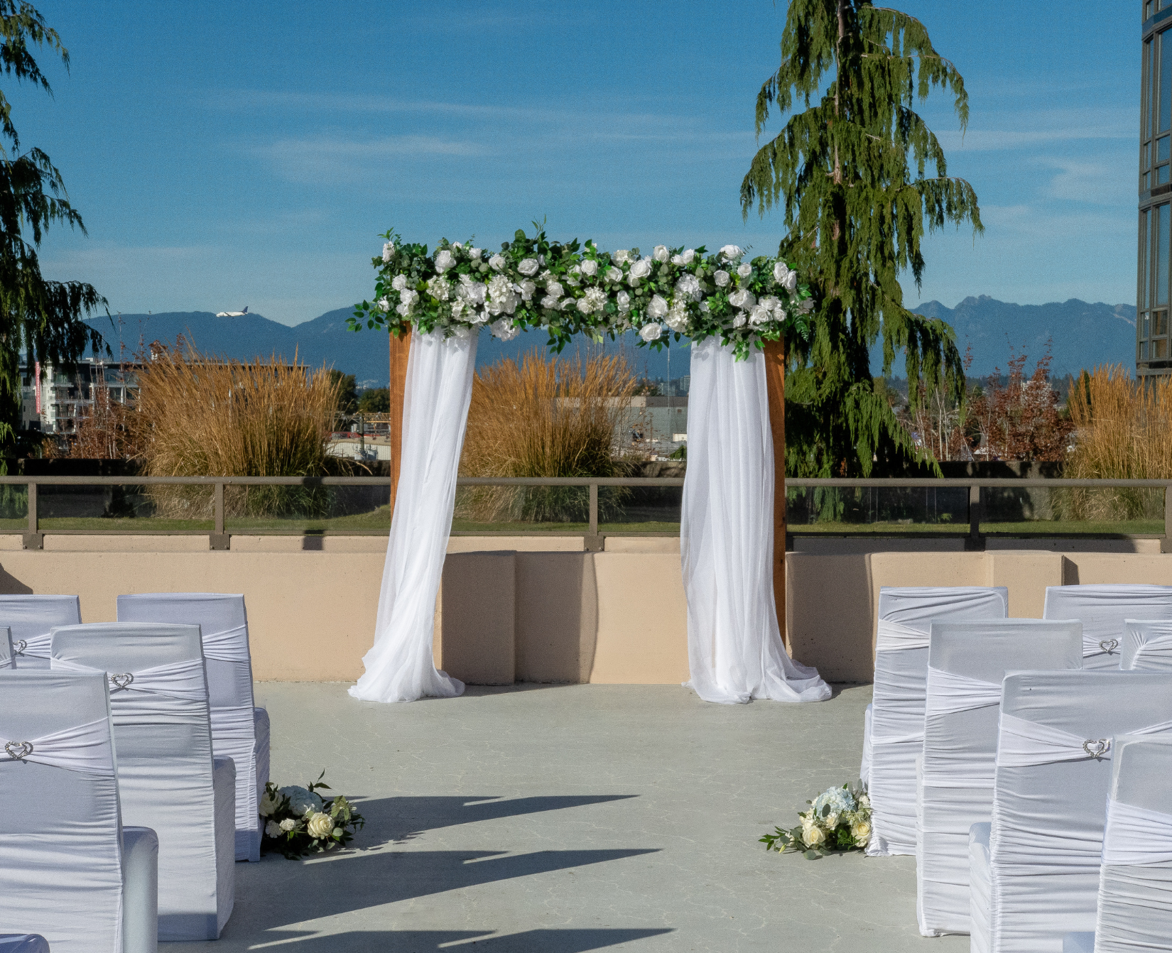 outdoor wedding ceremony with mountain views in Richmond, BC