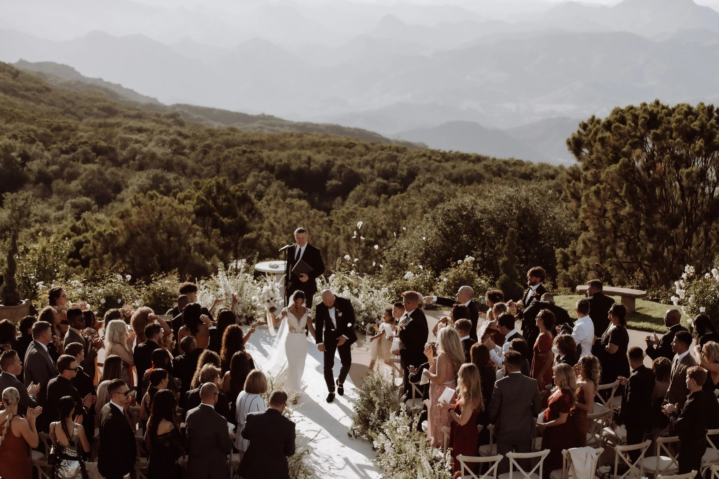 Stone Mountain Estates end of a ceremony when the bride and groom are cheering of joy.jpg