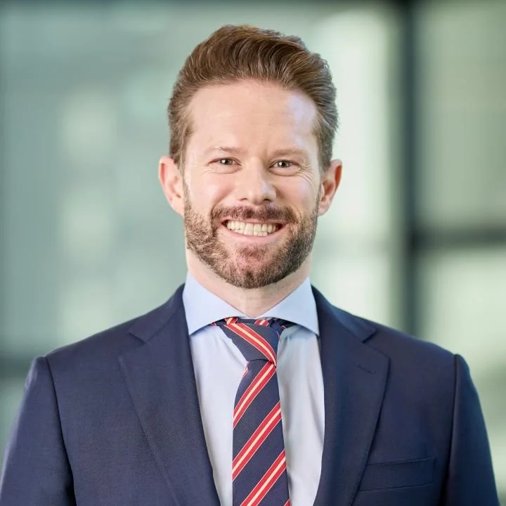 Portrait of Marcus Bailey, professional M&A advisor and corporate finance expert, smiling in business attire, Adelaide 2024