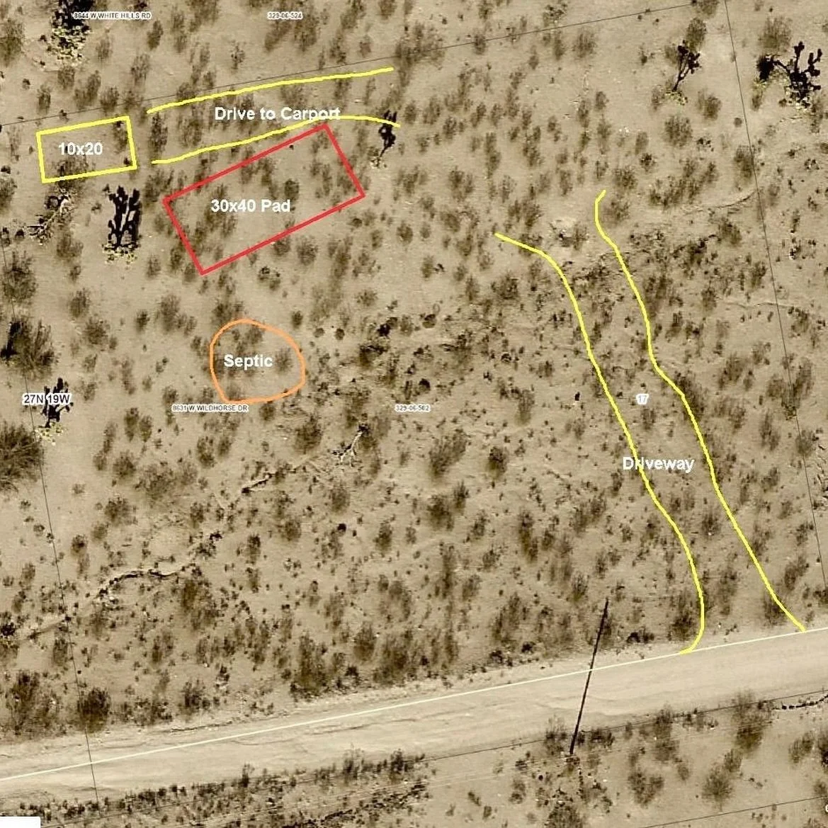 Aerial map of desert land with marked areas and routes, including a driveway, septic area, camping pad, and a small square plot, with handwritten labels and boundaries marked in yellow, red, and orange.