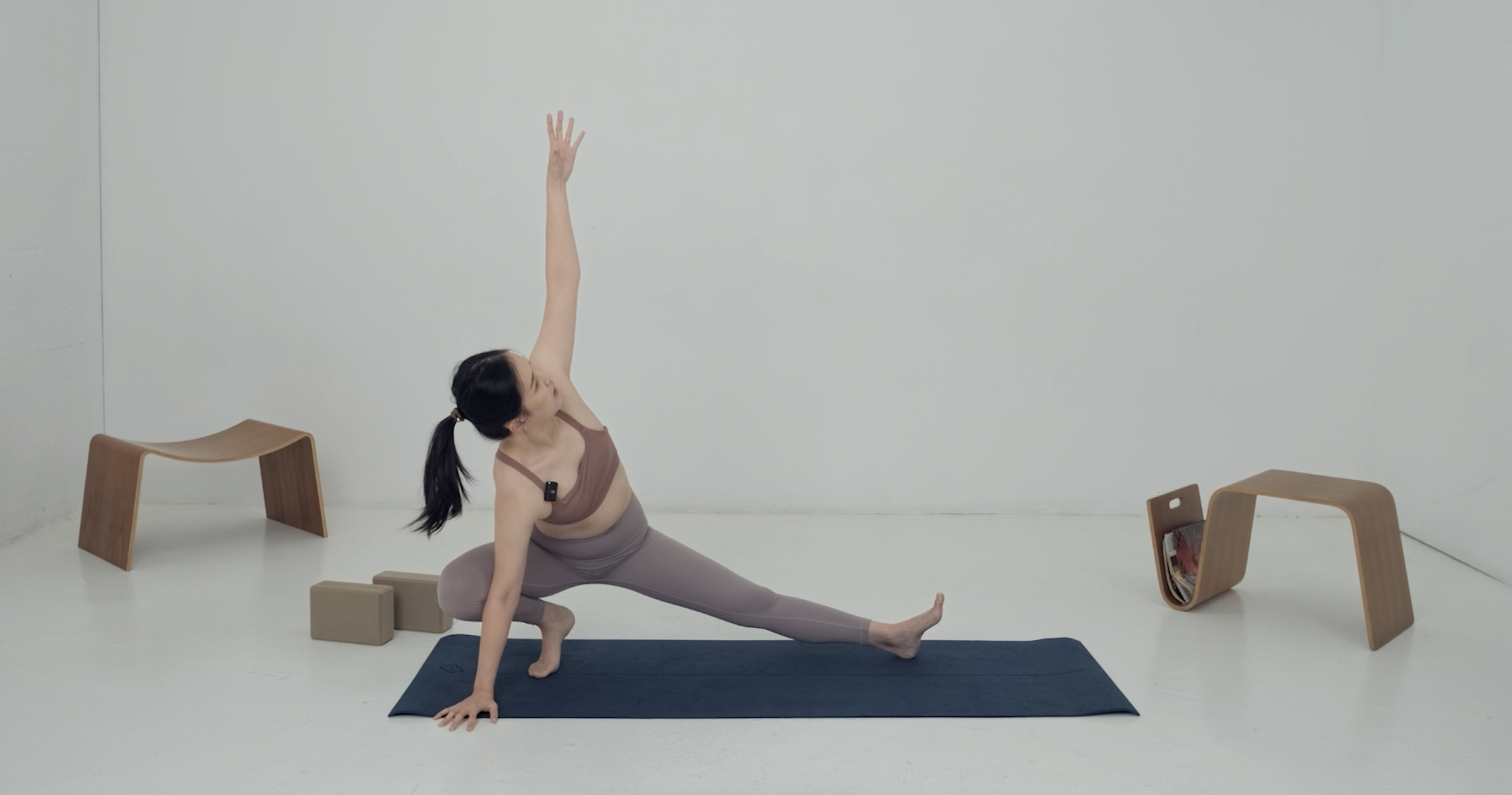 stretching instructor doing a hip stretch