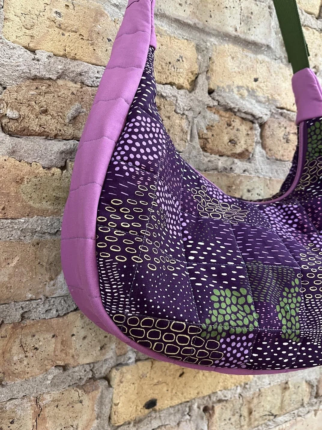 quilted crescent bag details.