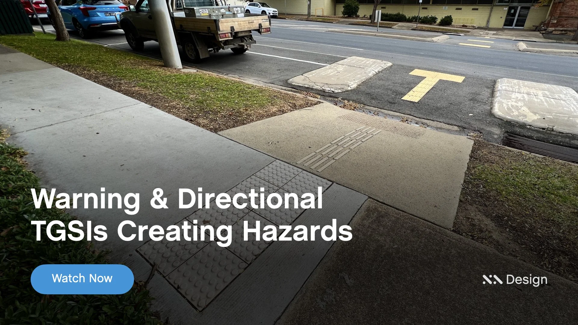 Staebl Academy - Banner for Learning Session - A footpath with Tactile (TGSIs), Warning & Directional, and a street with a vehicle parked near a traffic island. The street has warning signs indicating hazards and potential tripping dangers.