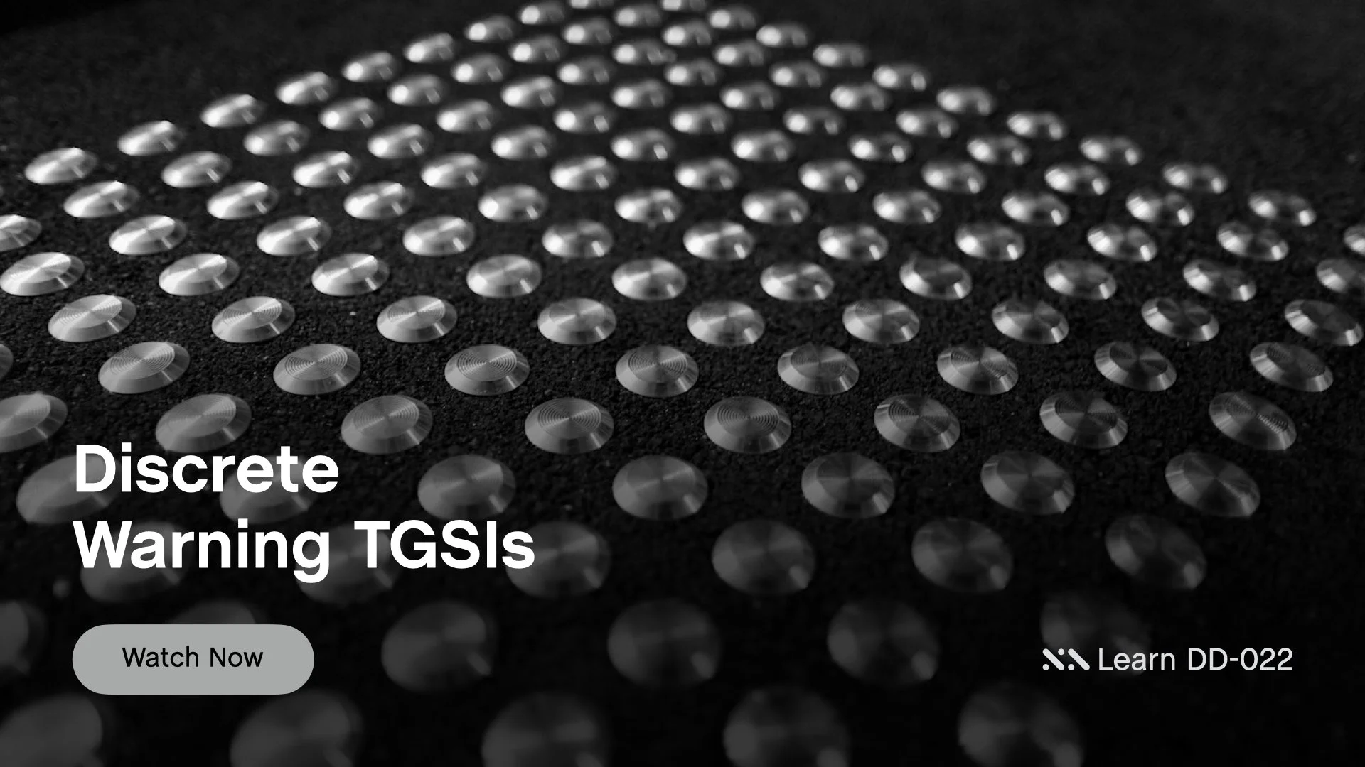 Staebl Academy - Discrete Warning TGSIs - Close-up of Individual TGSIs used as a warning cues for vision impaired persons, text "Discrete Warning TGSI" and a button labeled "Watch Now".