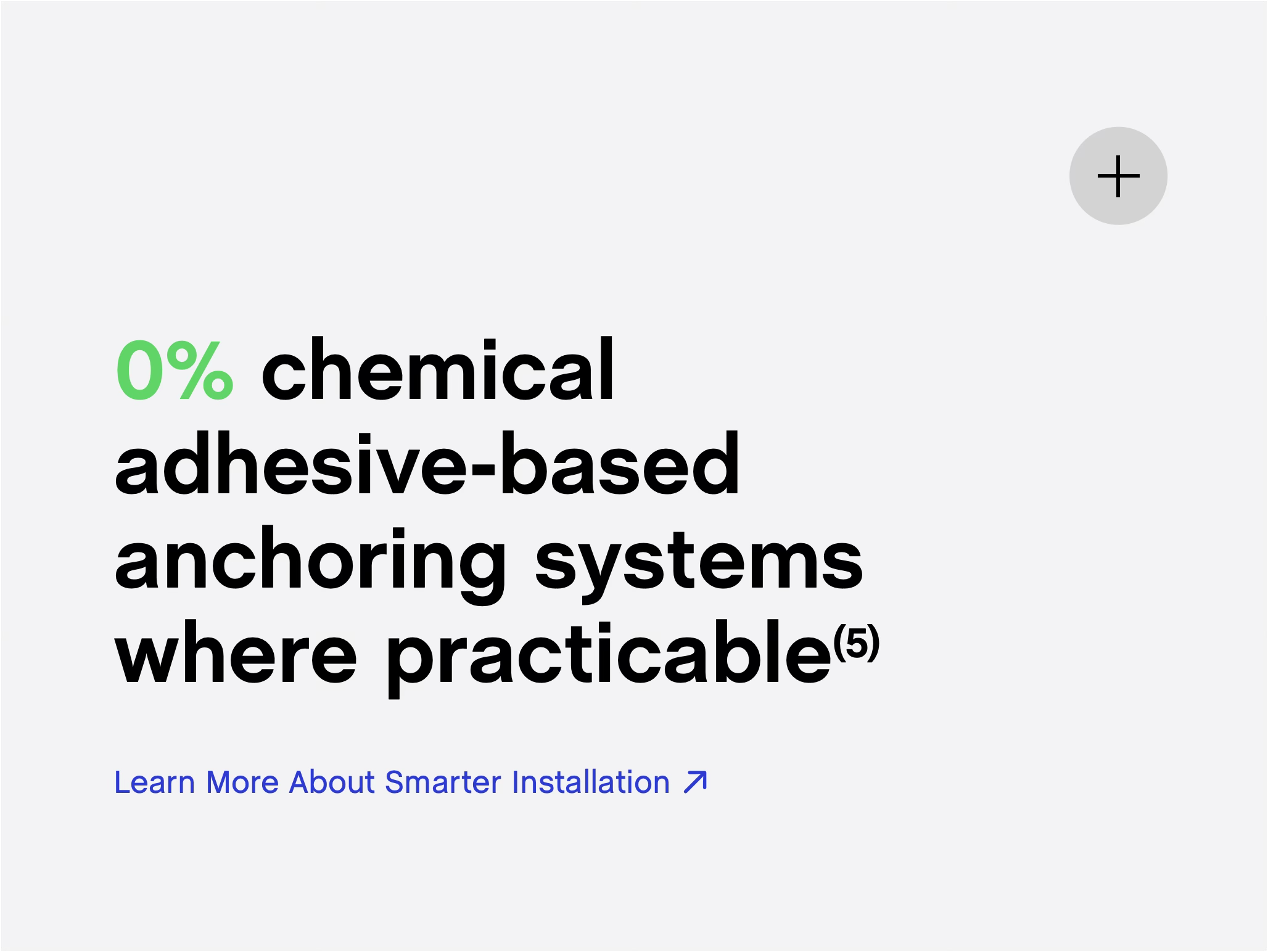 Close-up of a webpage with the text '0% chemical adhesive-based anchoring systems where practicable' and a 'Learn More About Smarter Installation' link, with a plus icon in the top right corner.