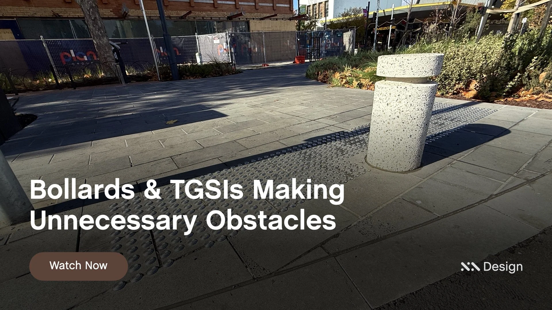 Staebl Academy - Banner for Learning Session - Public footpath with bollards and tactile paving, Warning Tactiles (TGSIs), with a new construction fence and trees in the background. The Bollard is installed on top of the Warning TGSIs.