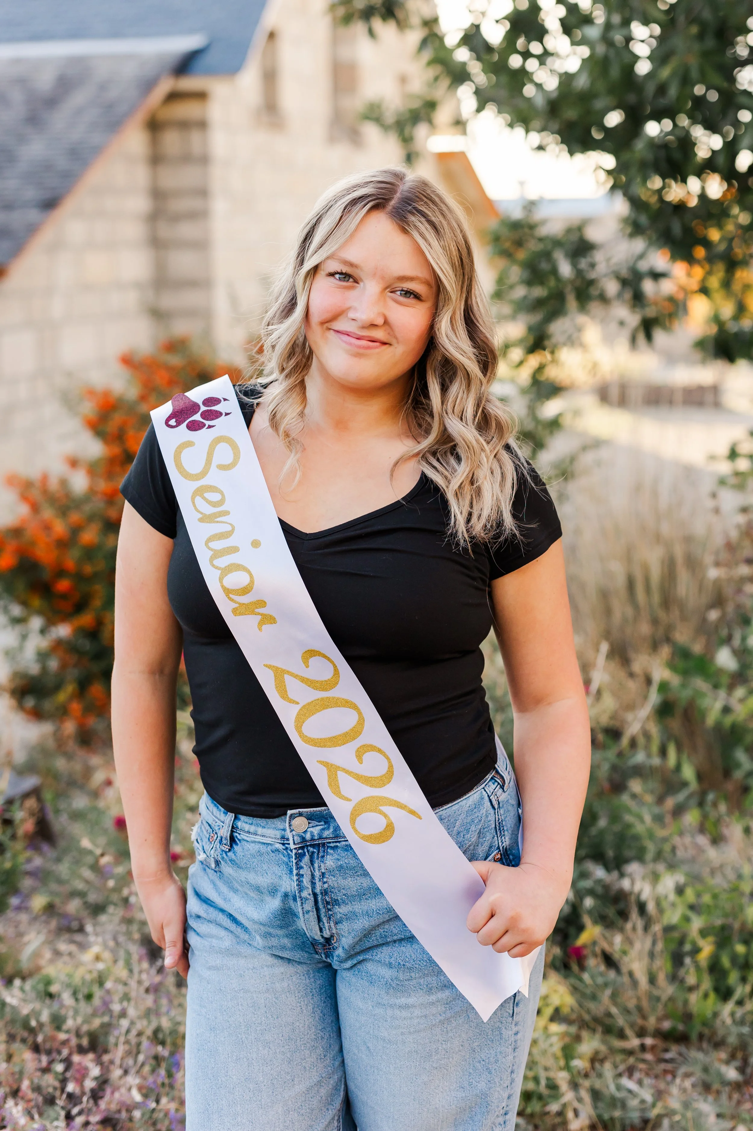 Senior with sash
