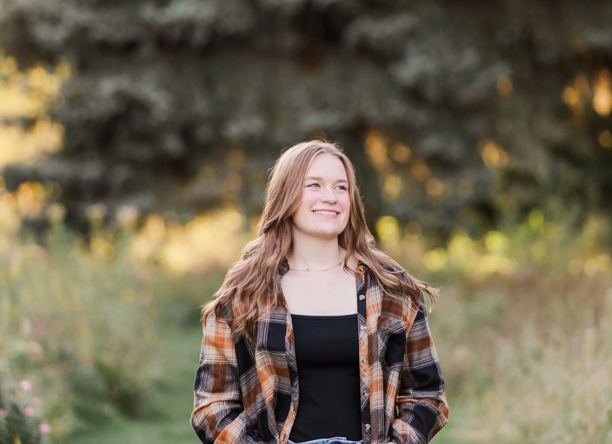 Senior smiling over shoulder