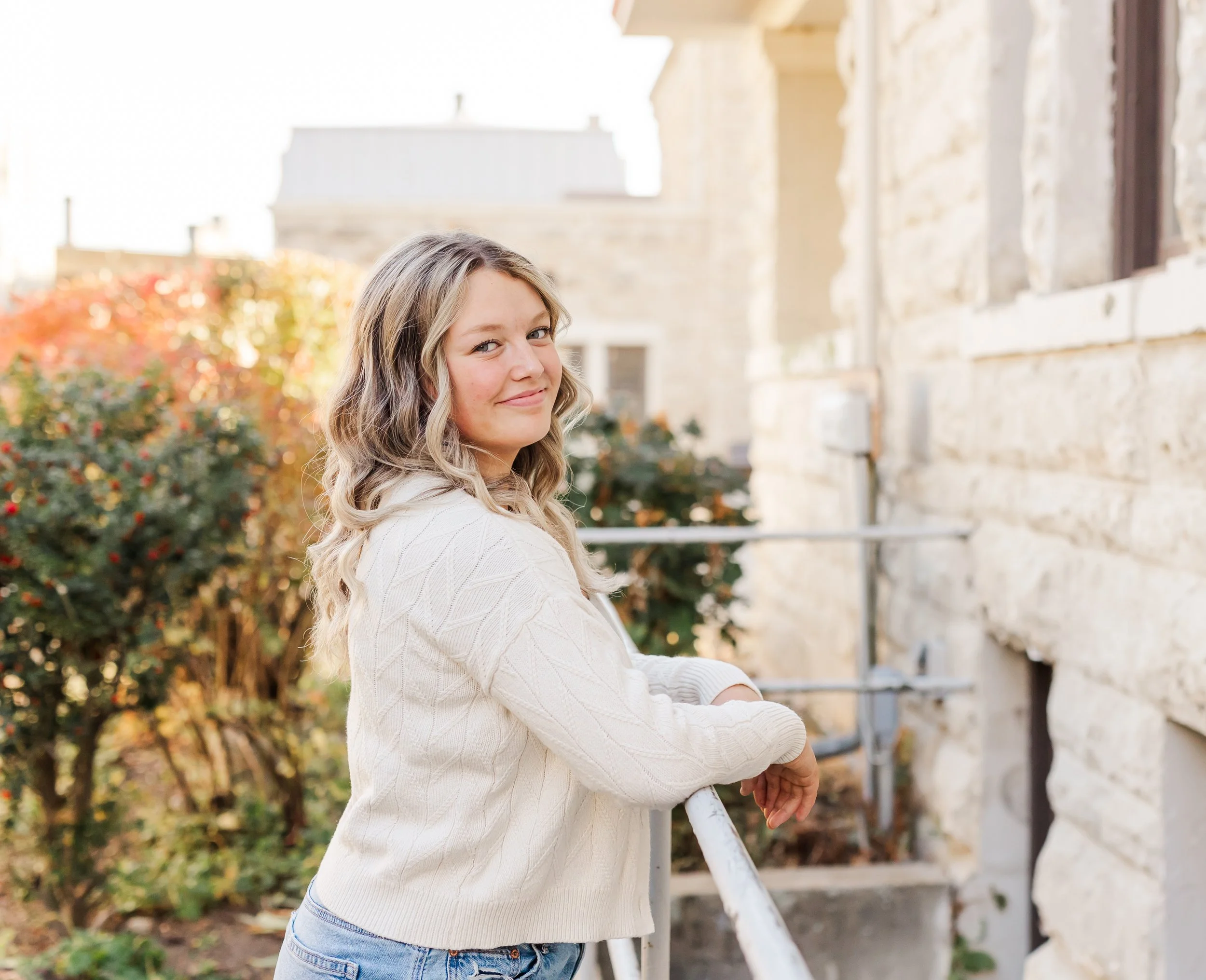 Senior smiling at the camera