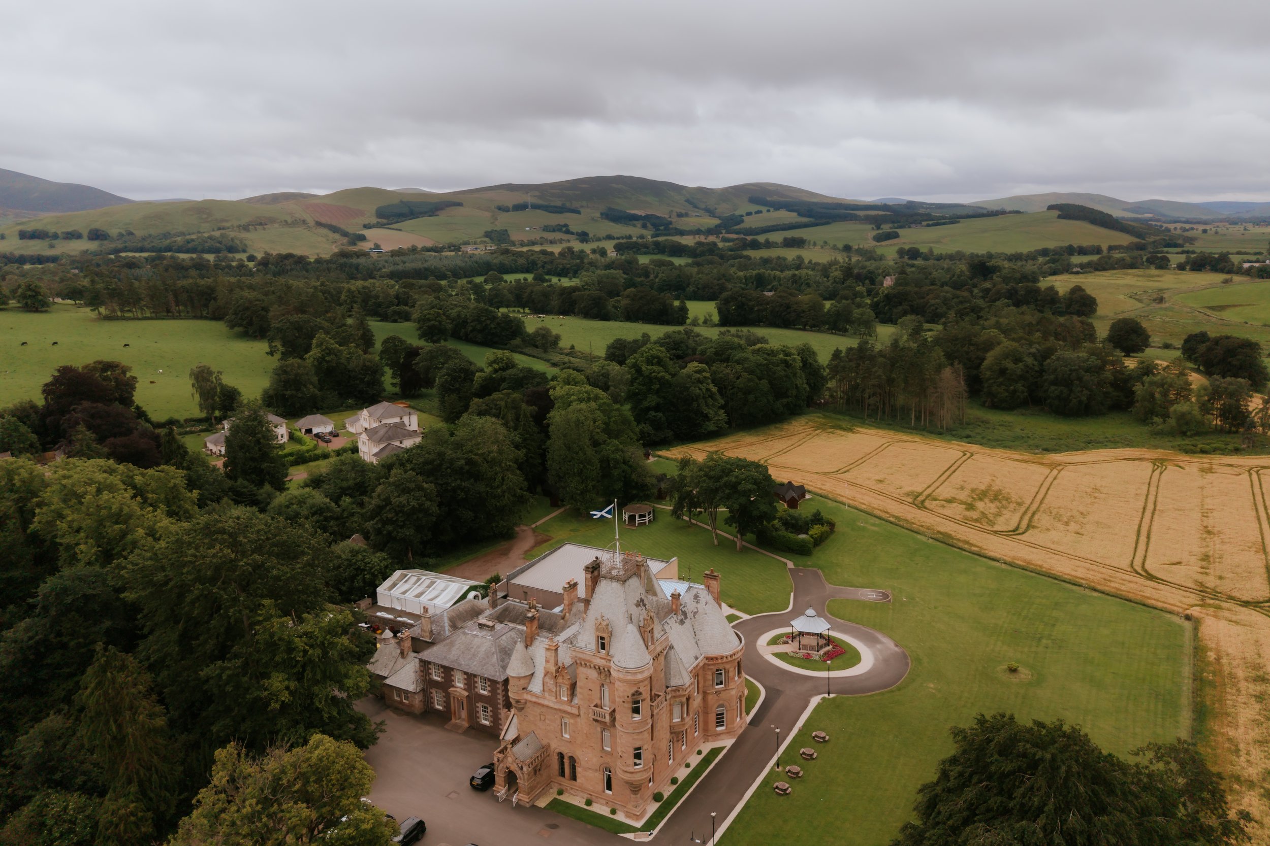 Aerial view of Cornhill Castle and its grounds in the countryside near Biggar.