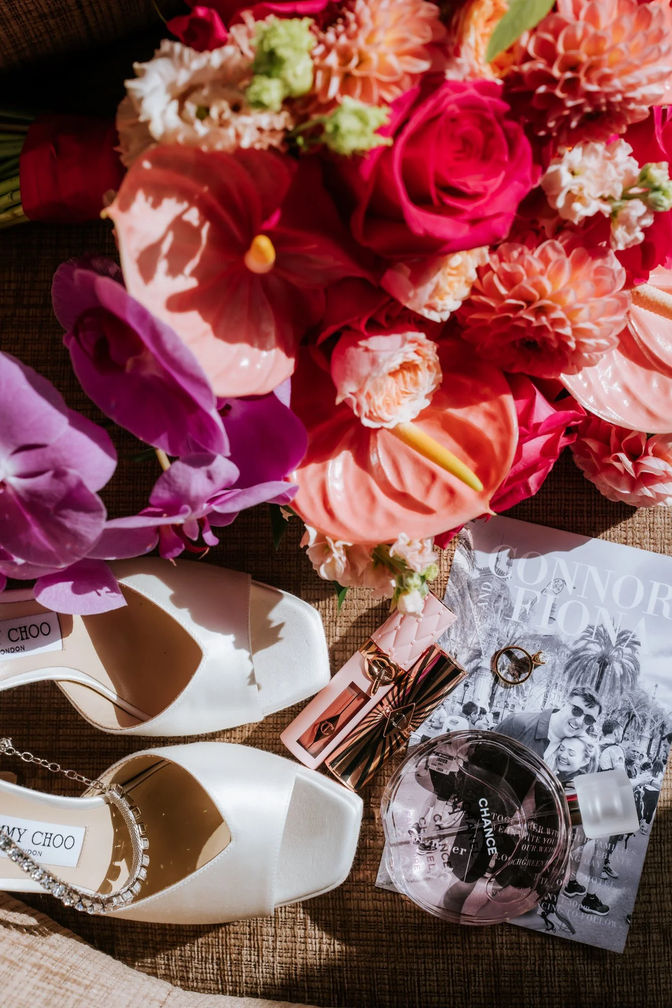 Colourful bridal flowers, wedding shoes and Fiona and Connor’s stationery.
