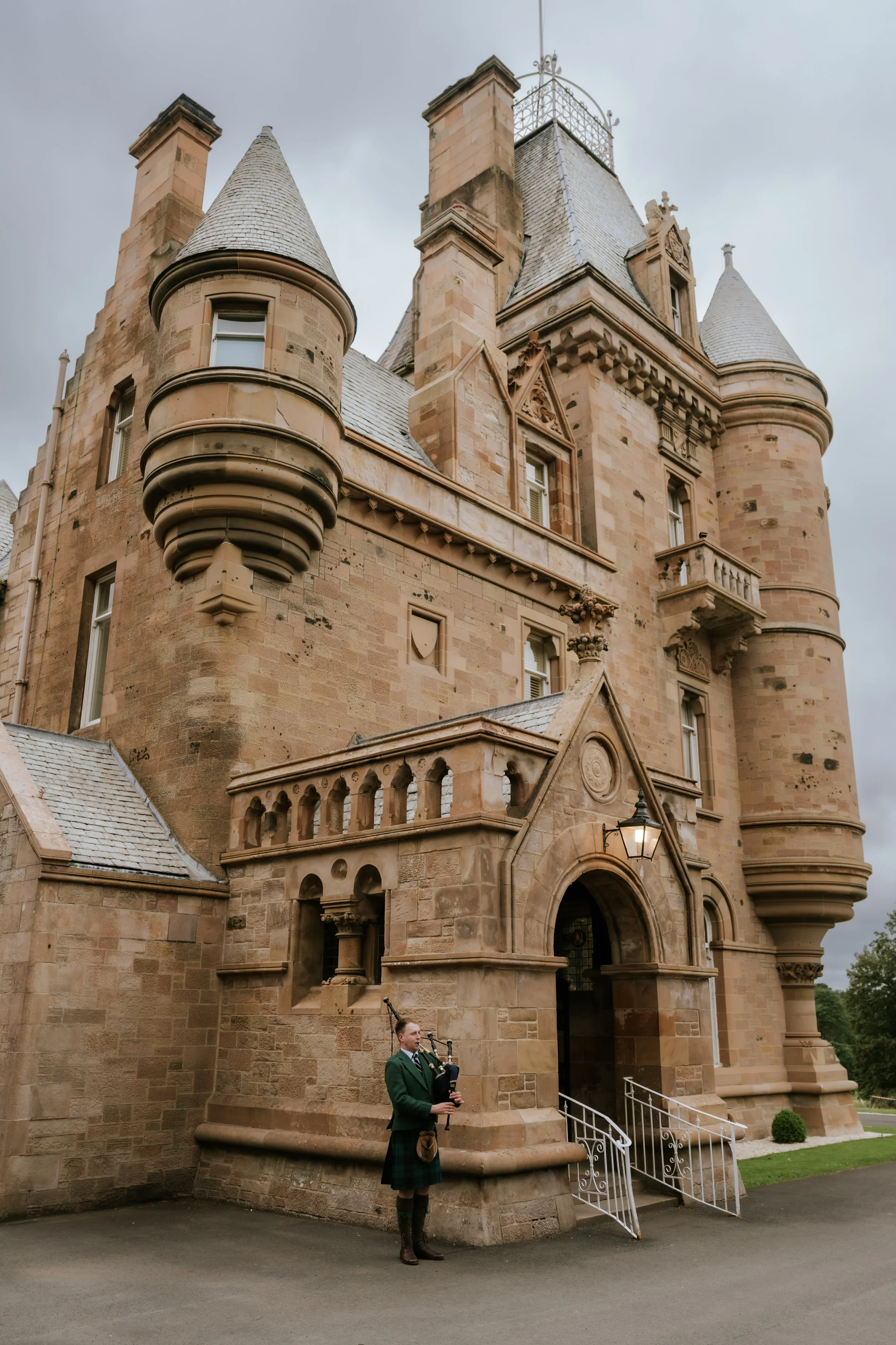 The turrets and stone entrance of Cornhill Castle on Emma and Frazer’s wedding day.