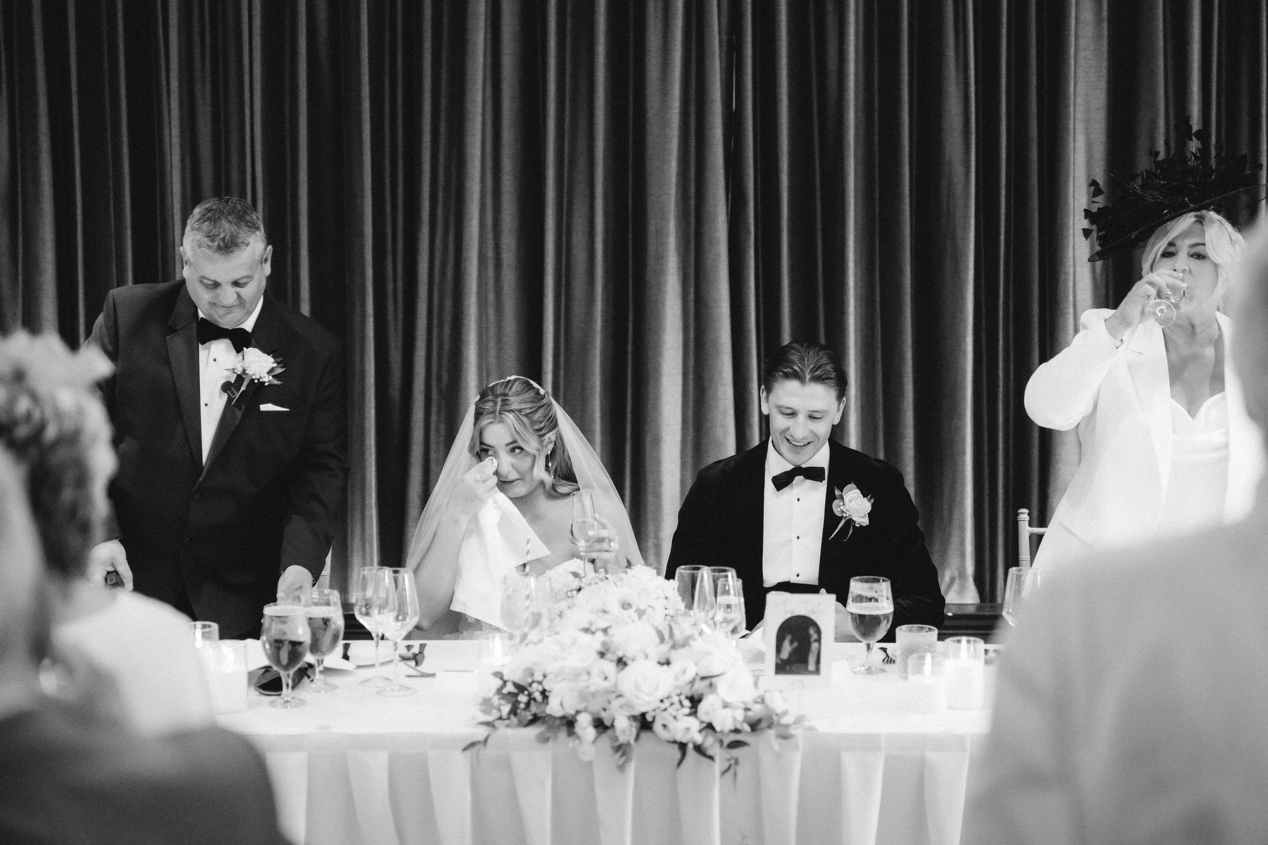 Emma reacting with laughter during the speeches at Cornhill Castle.