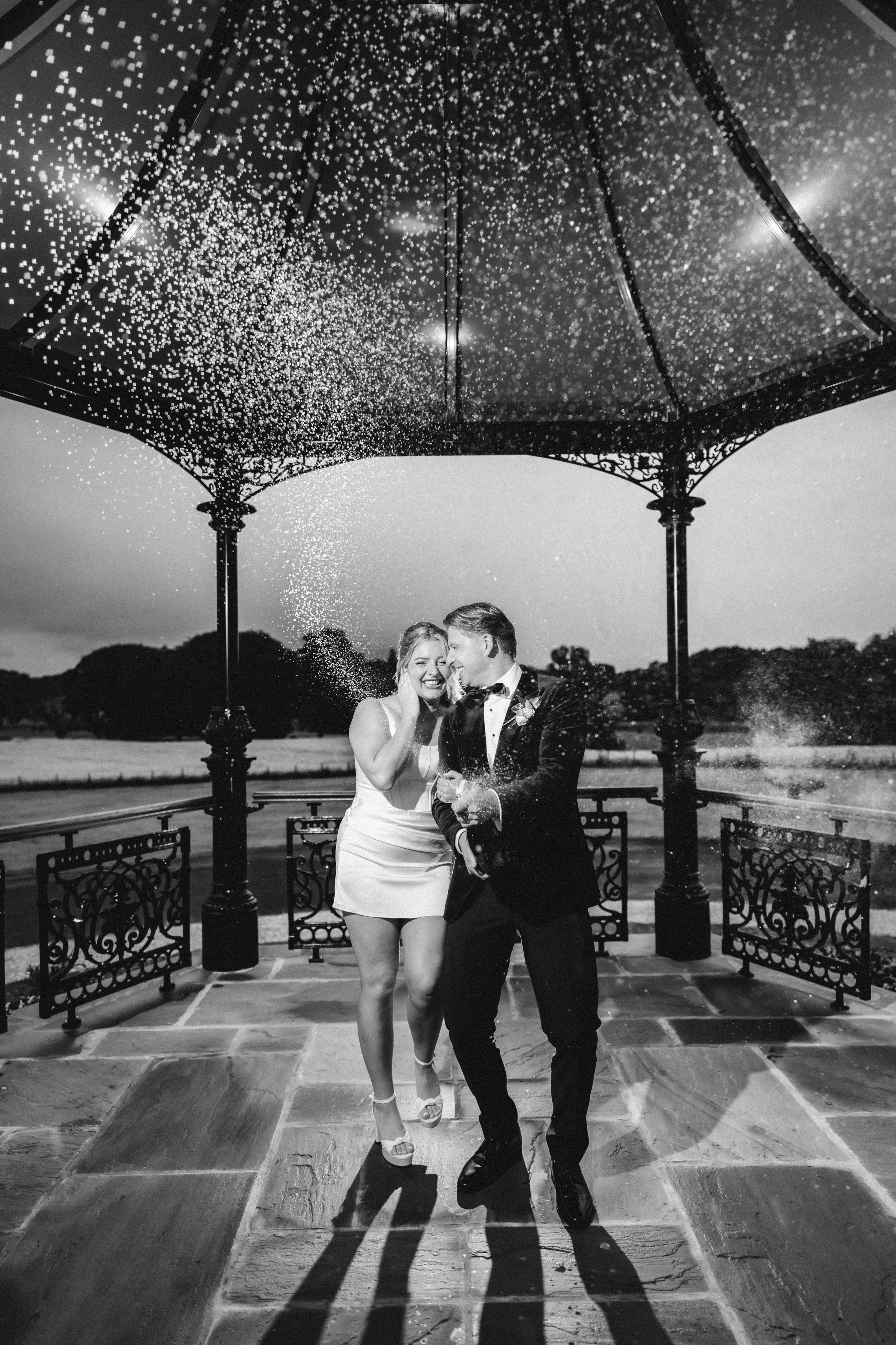 An evening kiss beneath Cornhill Castle’s outdoor bandstand.
